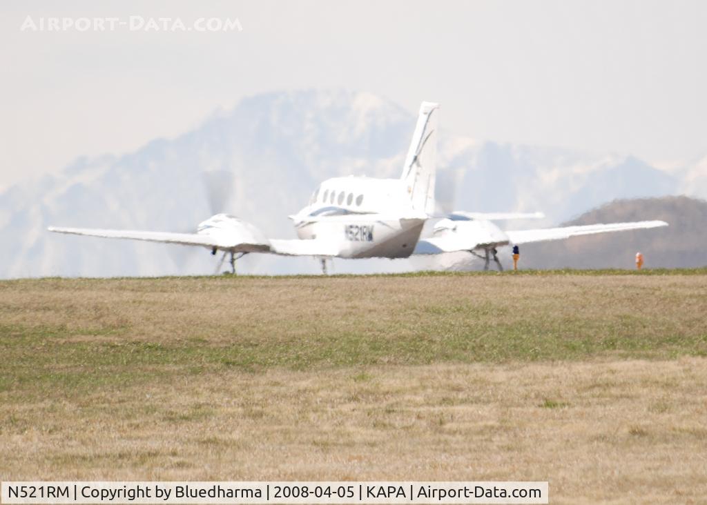 N521RM, 1977 Cessna 421C Golden Eagle C/N 421C0335, Takeoff on 17L. Pikes peak in the background.