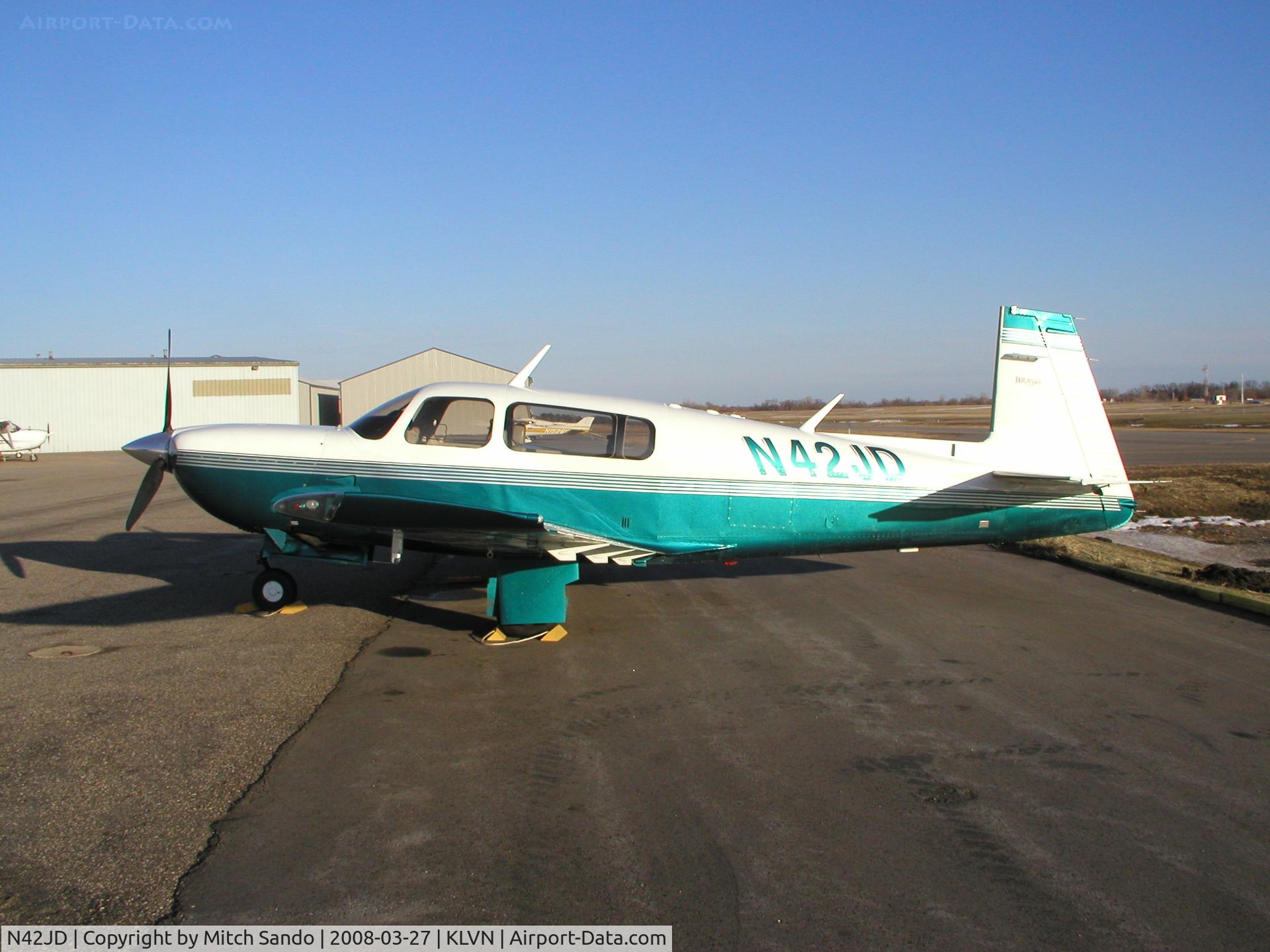 N42JD, 2000 Mooney M20M Bravo C/N 27-0303, Parked on the ramp at Airlake.