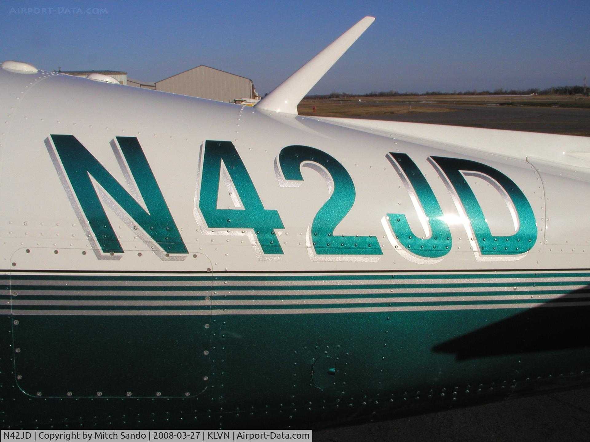 N42JD, 2000 Mooney M20M Bravo C/N 27-0303, Parked on the ramp at Airlake.