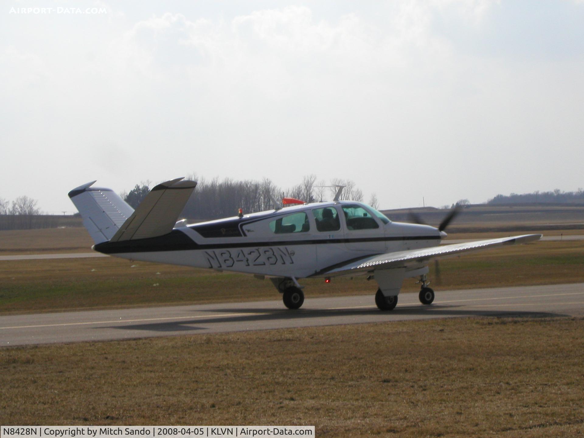 N8428N, 1968 Beech V35A Bonanza C/N D-8788, Taxiing for a Runway 12 departure.
