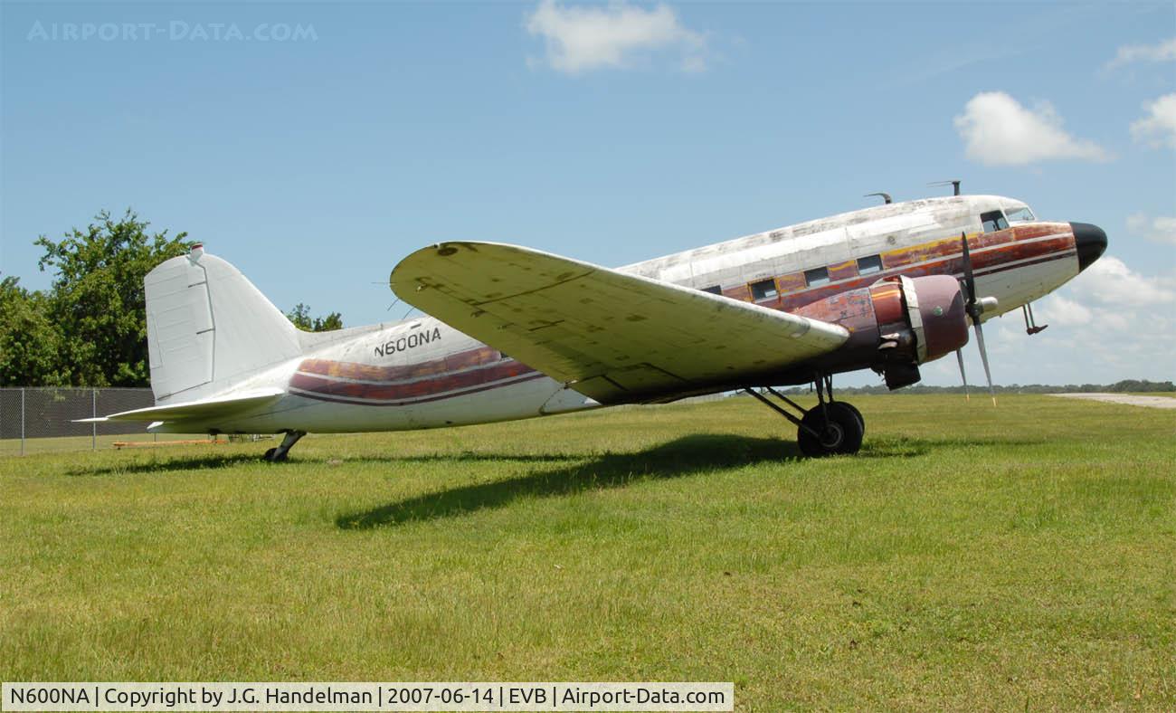 N600NA, 1940 Douglas DC-3A-228D C/N 3291, on the grass at New Smyrna Beach FL