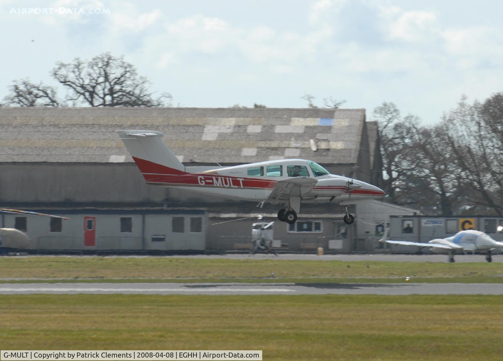 G-MULT, 1981 Beech 76 Duchess C/N ME-396, LANDING RUNWAY 26