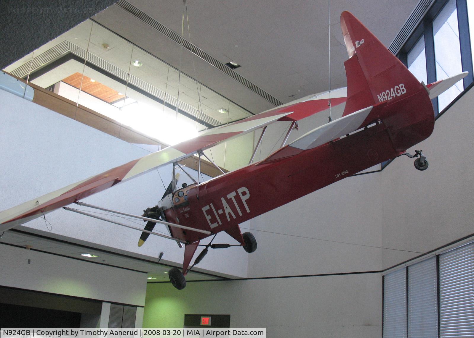 N924GB, 1936 Luton LA4A Minor C/N PAL1124, Hanging in the terminal near gate E12
