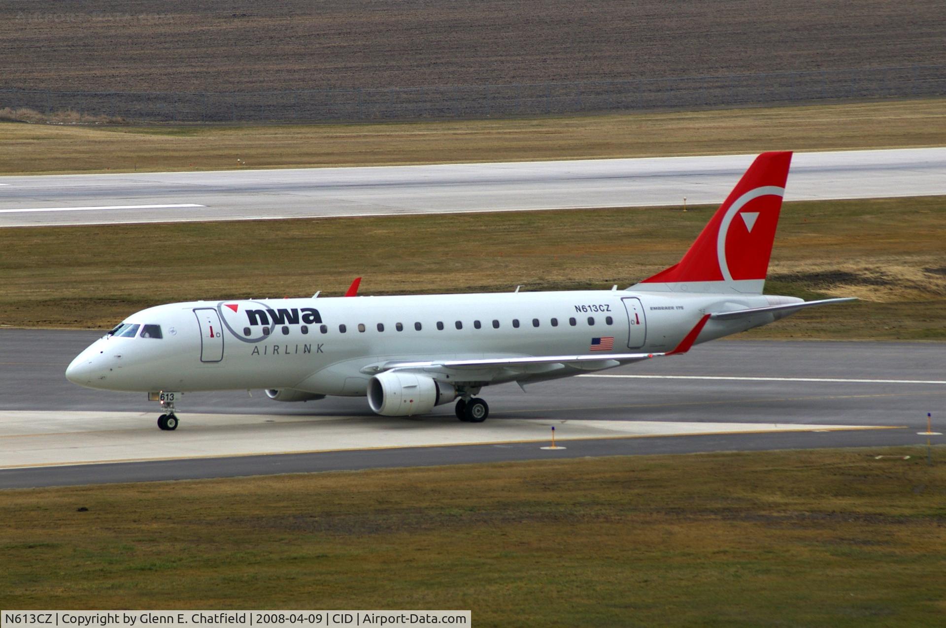 N613CZ, 2008 Embraer 175LR (ERJ-170-200LR) C/N 17000203, On Alpha, just crossed Runway 13/31