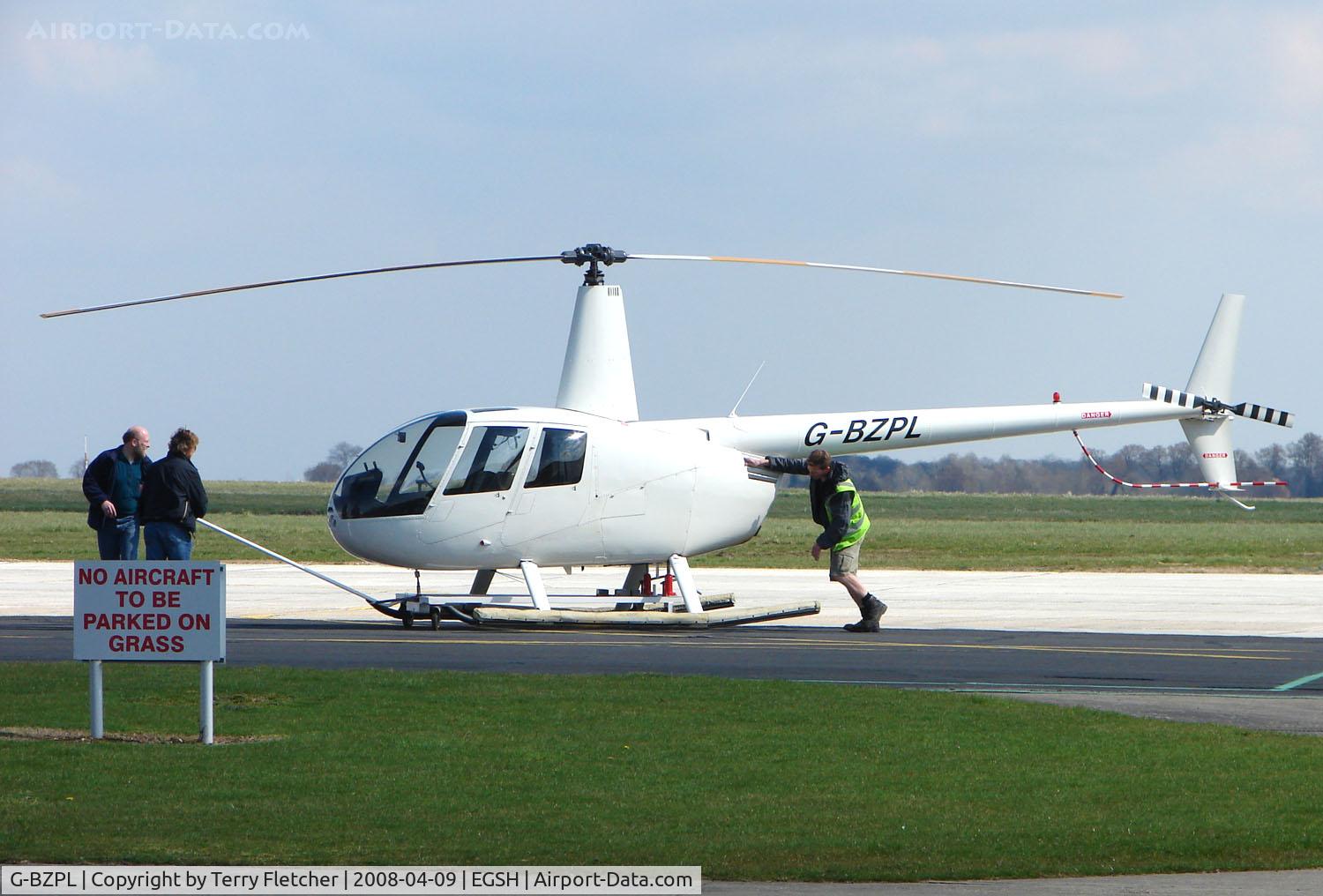 G-BZPL, 2000 Robinson R44 Clipper C/N 0948, Robinson R44 being pulled from Hangar to ramp at Norwich UK