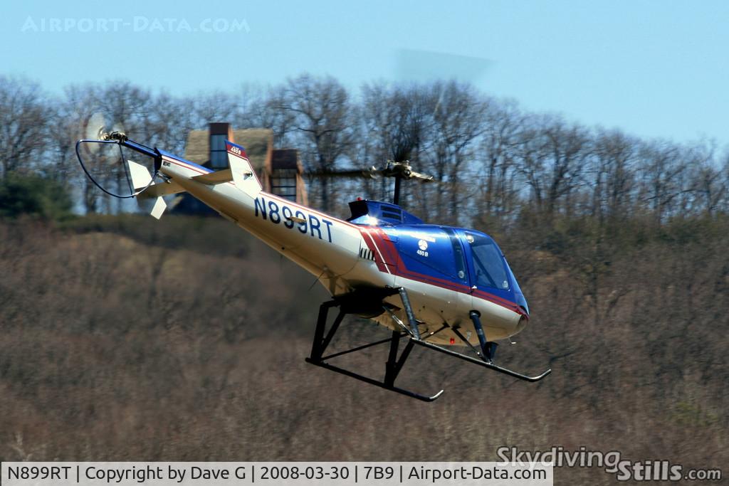 N899RT, 2002 Enstrom 480 C/N 5044, 9RT departs Ellington, CT to the South.