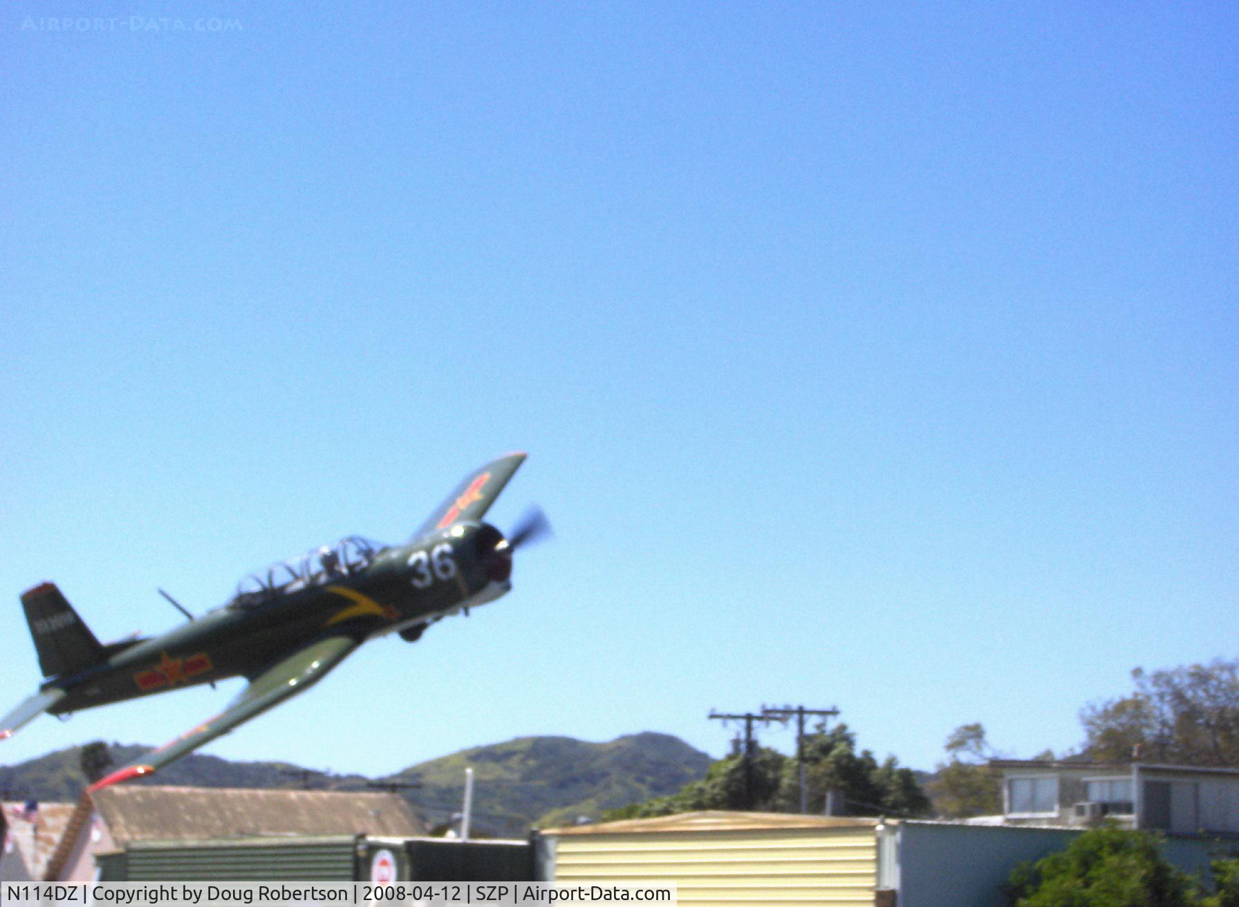 N114DZ, 1967 Nanchang CJ-6A C/N 2132018, 1967 Nanchang China CJ-6A, Vedeneev (Ivchenko) MP-14 360 Hp 9 cylinder radial upgrade conversion, takeoff climb Rwy 04 and departure bank for the camera