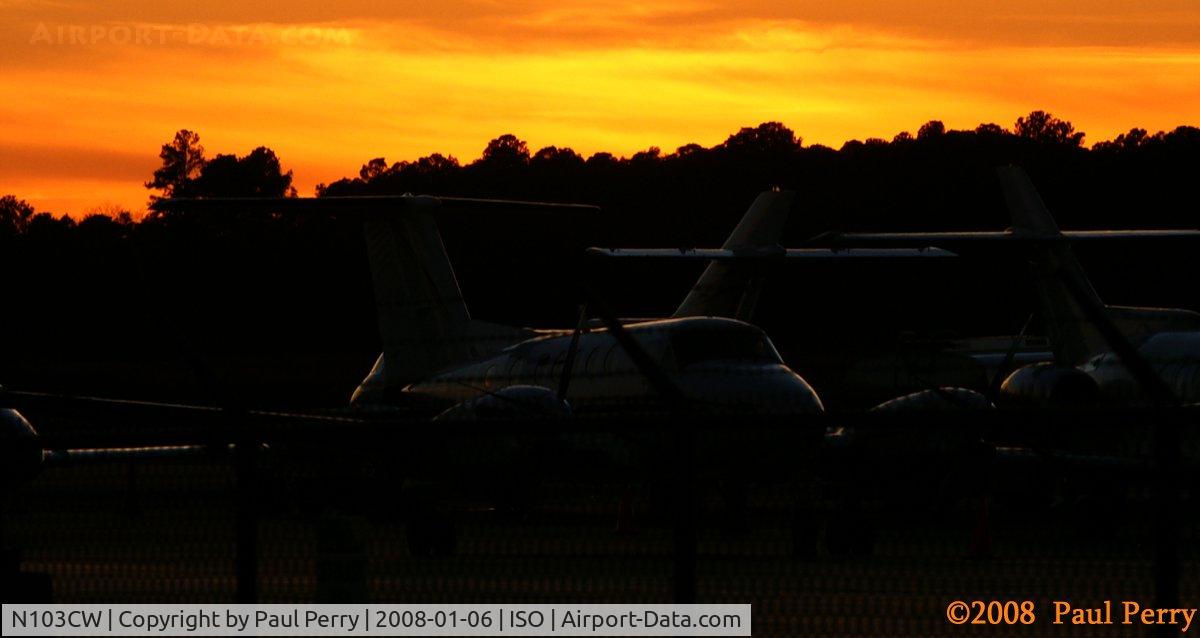 N103CW, 1985 Beech 300 C/N FA-64, Colorful sunset beyond this twin
