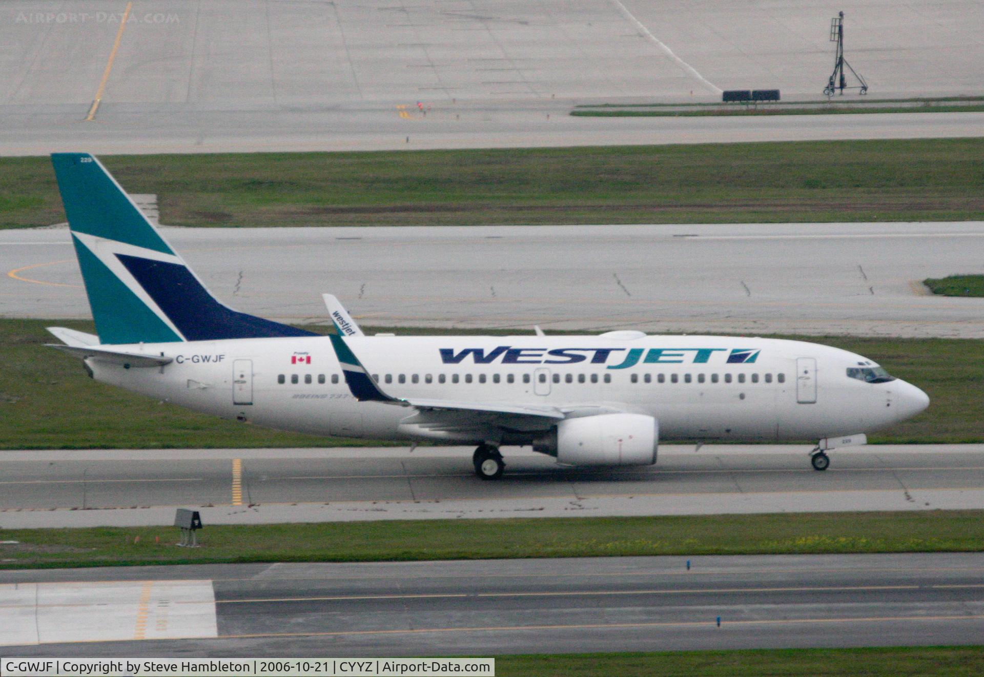 C-GWJF, 2004 Boeing 737-7CT C/N 32766, Taken from the bedroom window of the Sheraton Hotel
