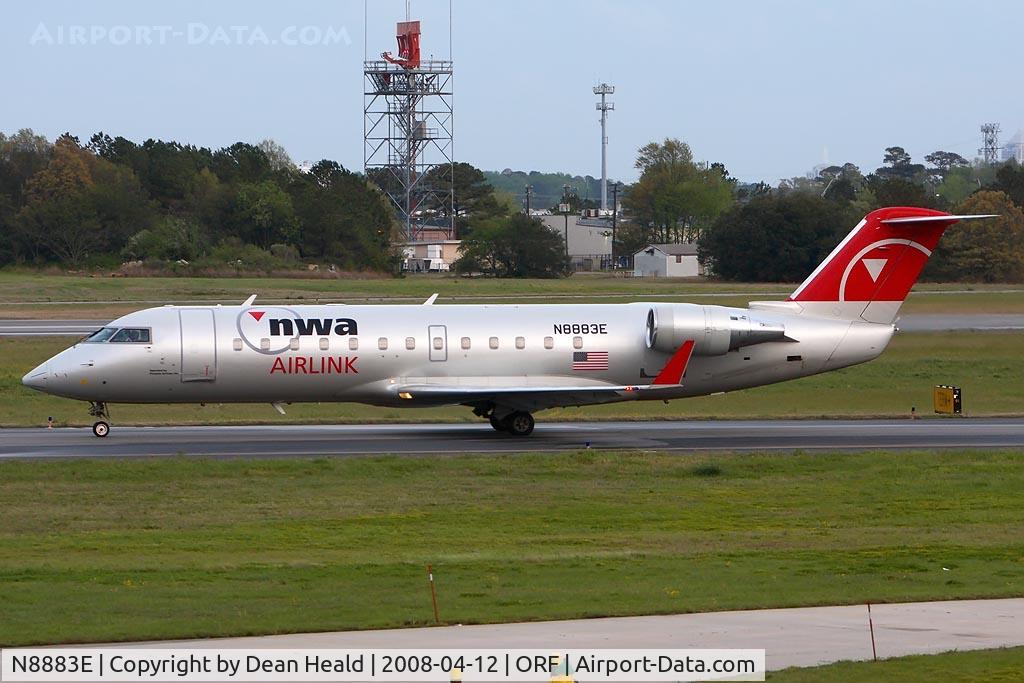 N8883E, 2003 Bombardier CRJ-200 (CL-600-2B19) C/N 7883, NWA Airlink (by Pinnacle Airlines) N8883E (FLT FLG5972) taxiing to RWY 23 for departure to North Central West Virginia (KCKB).