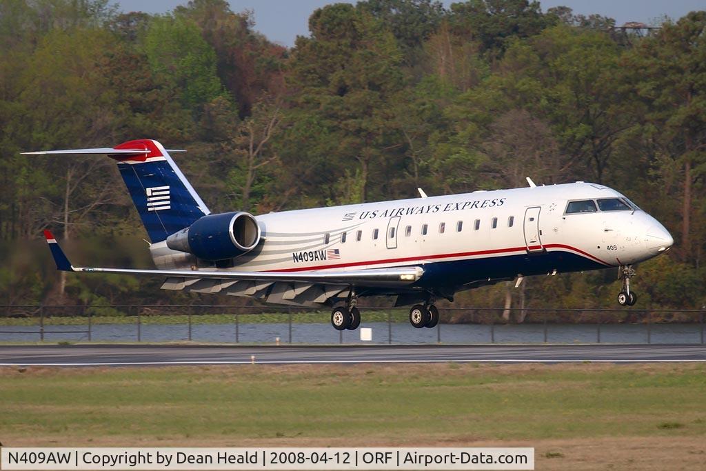 N409AW, 2000 Bombardier CRJ-200LR (CL-600-2B19) C/N 7447, US Airways Express (operated by Air Wisconsin) N409AW from Charlotte/Douglas Int'l (KCLT) landing on RWY 23.