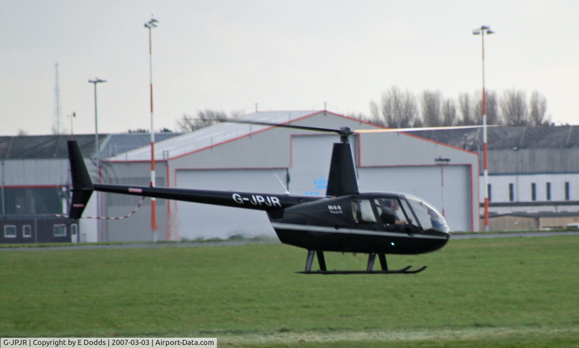 G-JPJR, 2006 Robinson R44 II C/N 11198, Hovering in Norwich, Norfolk