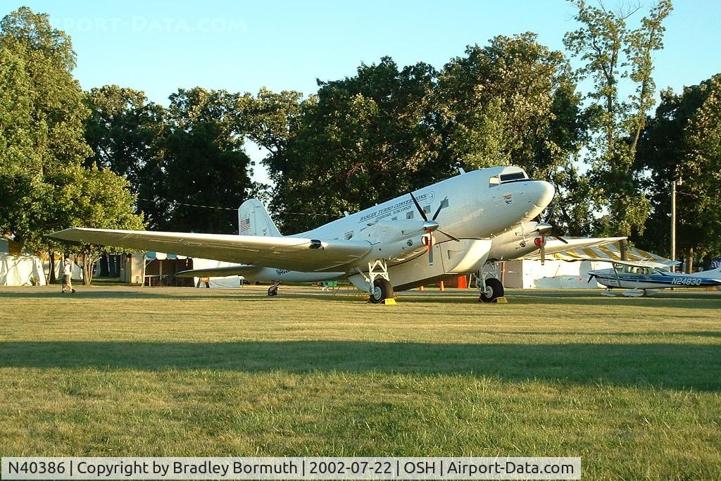 N40386, 1943 Douglas C-47B C/N 14675/26120, Taken during Oshkosh AirVenture 2002.  This is proof that the DC-3/C-47 series can be born again. This particular aircraft was converted from a C-47 to a turbo-prop fire tanker by Basler Turbo Conversions in Oshkosh, WI.