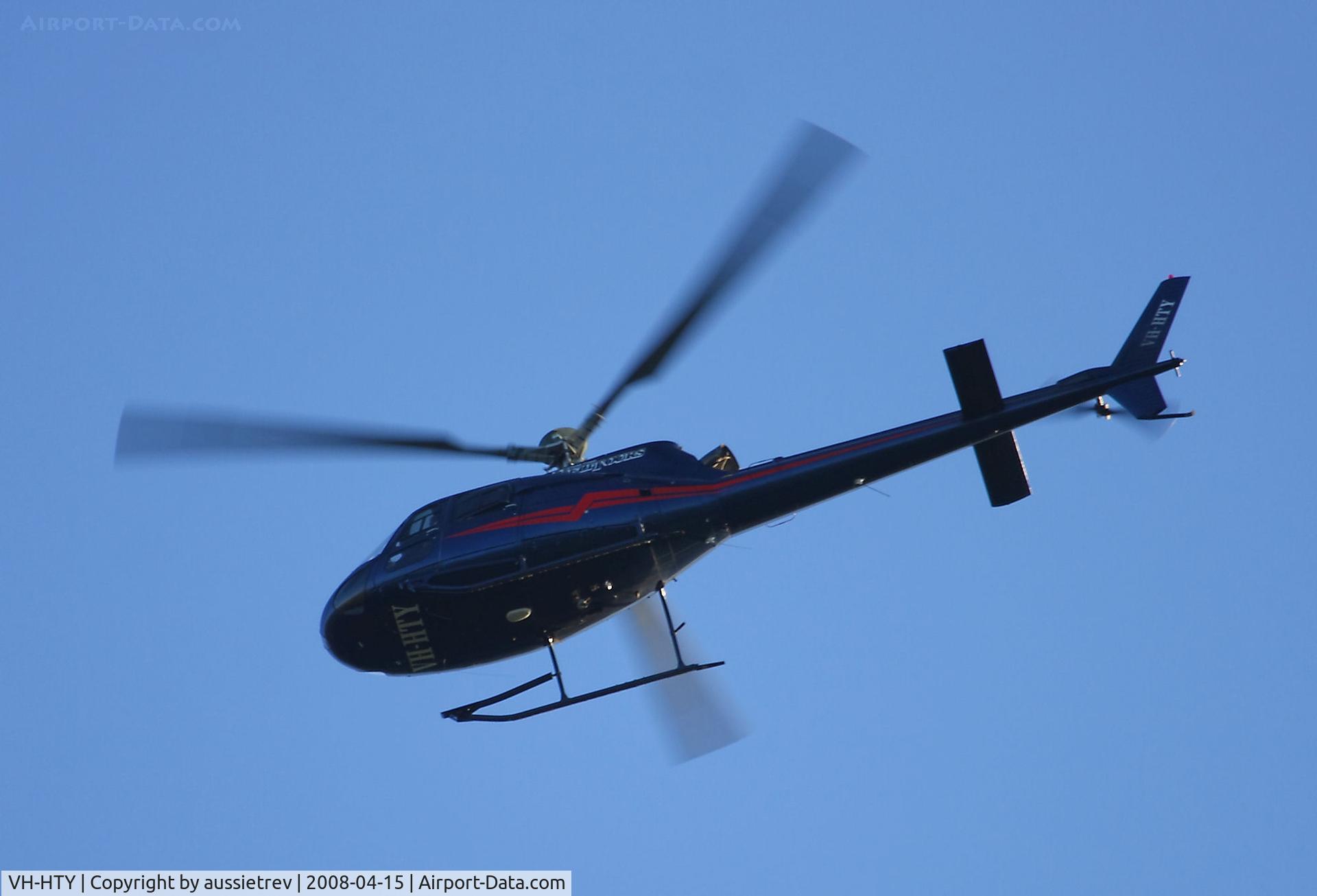 VH-HTY, 1989 Eurocopter AS-350BA Ecureuil C/N 2270, Eurocopter Southbound over the Gold Coast late afternoon
