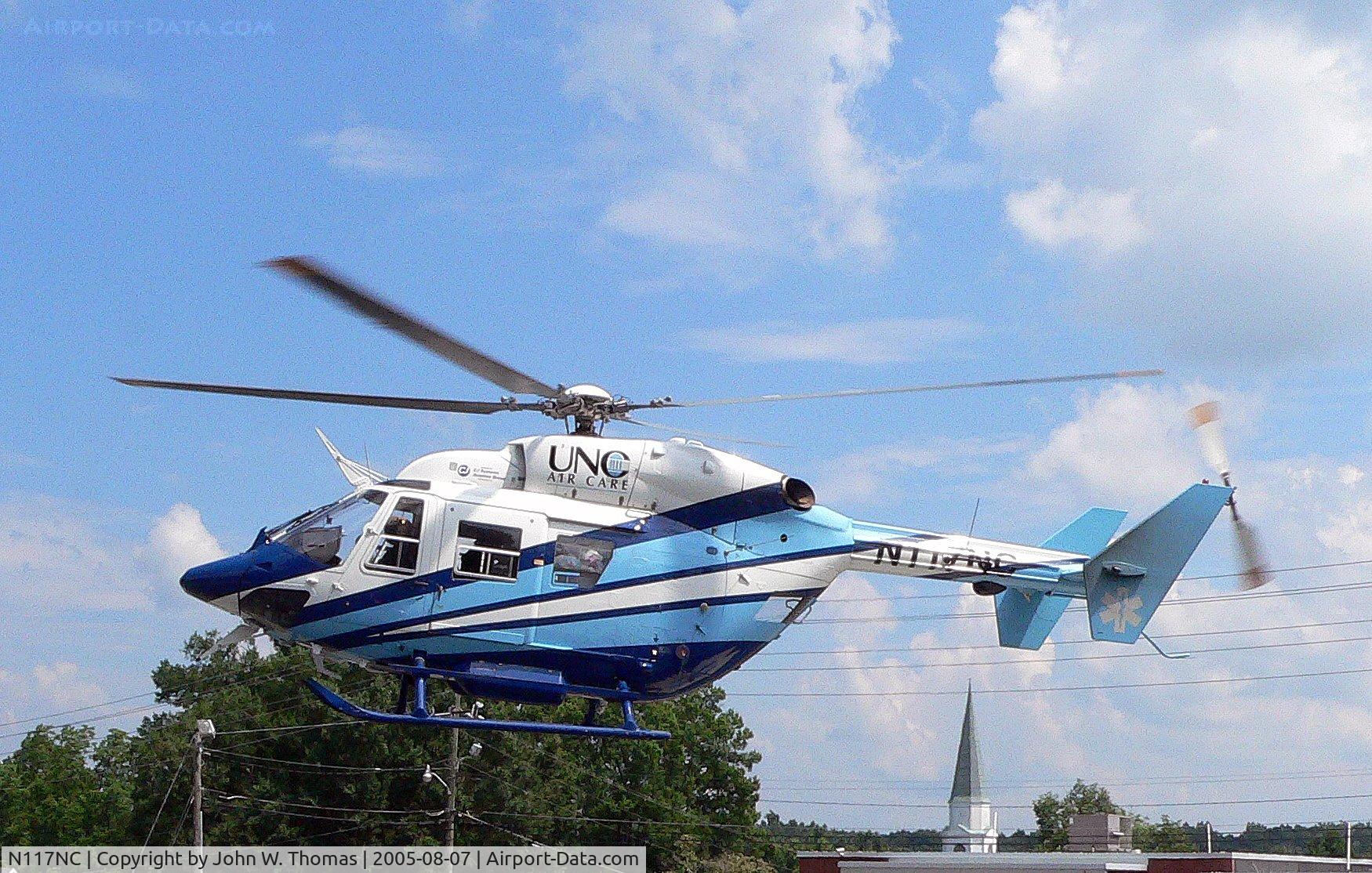 N117NC, 1997 Eurocopter-Kawasaki BK-117C-1 C/N 7517, Departing Chatham Hospital
