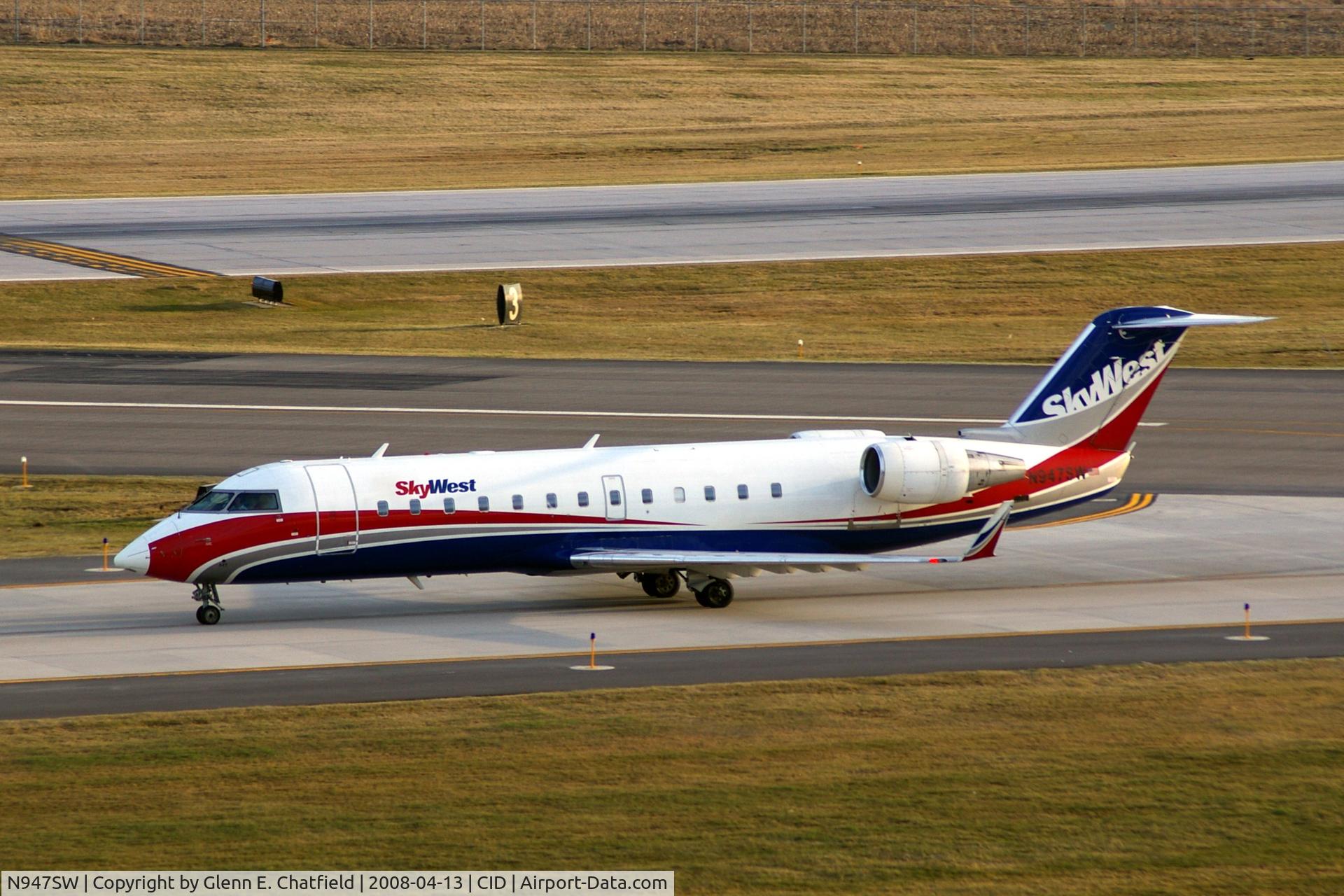 N947SW, 2003 Bombardier CRJ-200LR (CL-600-2B19) C/N 7786, Taxiing in on Alpha after landing Runway 27, late afternoon