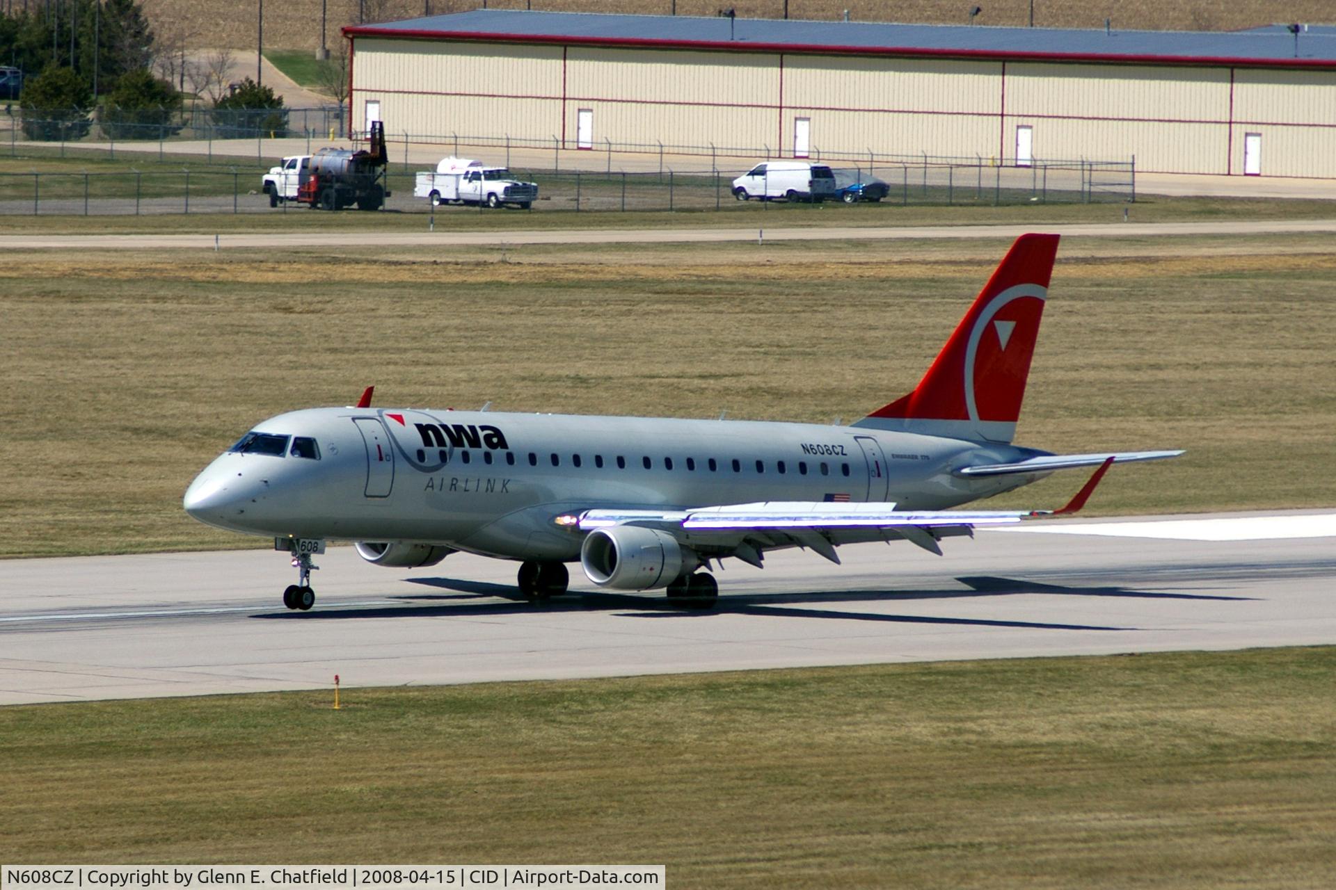 N608CZ, 2007 Embraer 175LR (ERJ-170-200LR) C/N 17000195, Nose gear still not down on the pavement