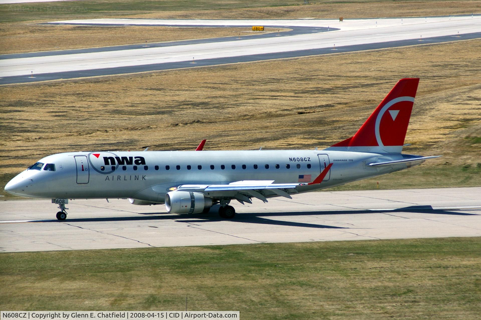 N608CZ, 2007 Embraer 175LR (ERJ-170-200LR) C/N 17000195, Rolling out after landing runway 13; I didn't lead far enough and almost cut off the nose!