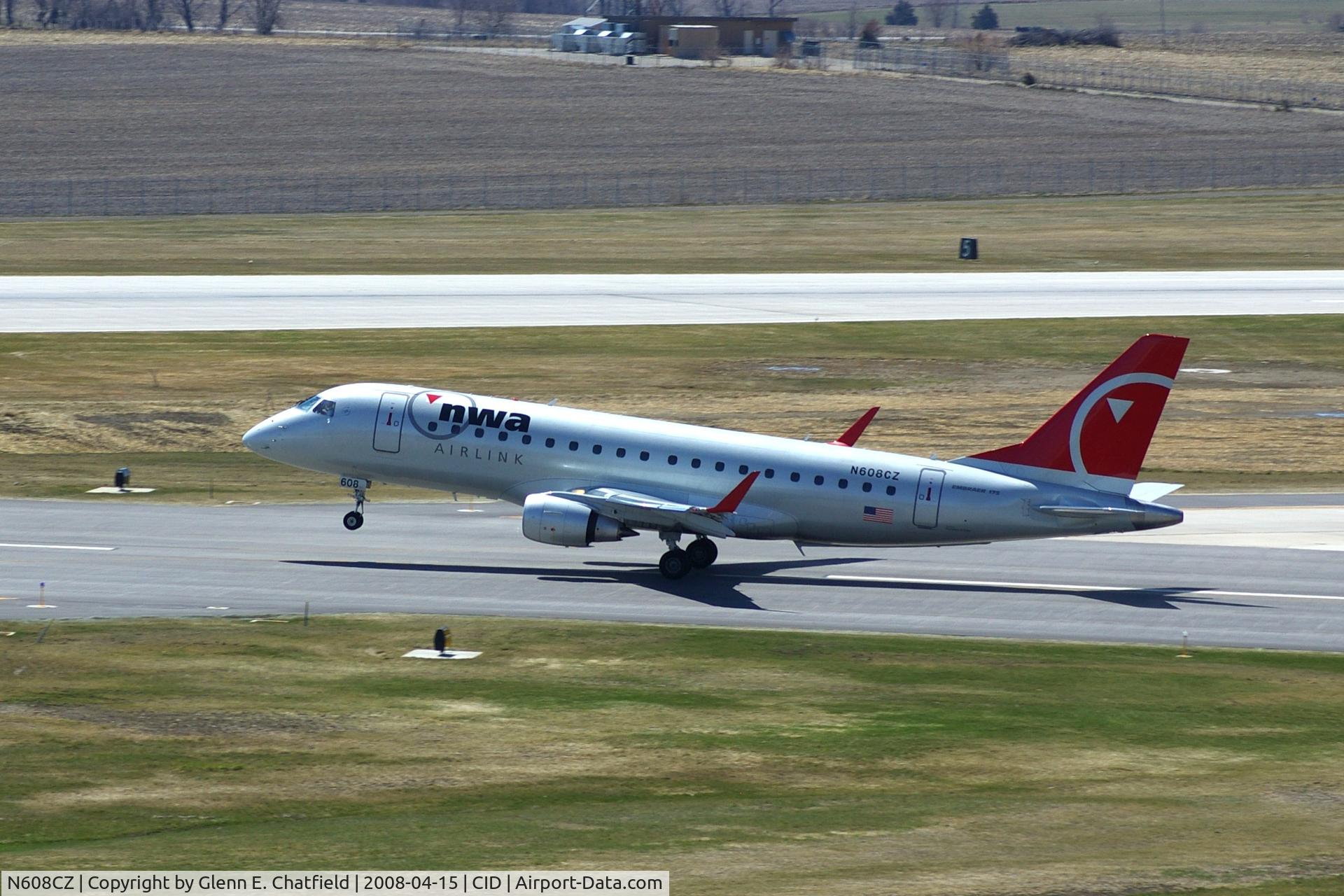 N608CZ, 2007 Embraer 175LR (ERJ-170-200LR) C/N 17000195, Compass taking off on Runway 13, rotating at Alpha, about 2700 feet from approach end