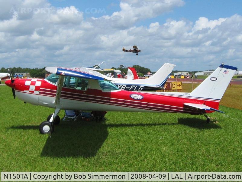 N150TA, 1976 Cessna A150L Aerobat C/N A1500683, Sun N Fun 2008.  New Standard flying by in the background.