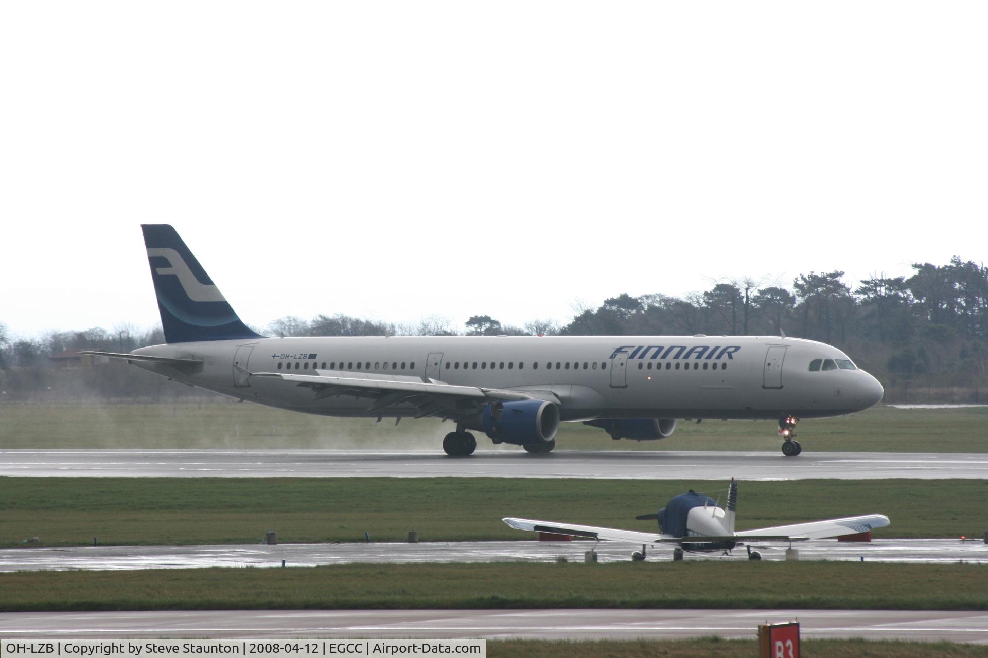 OH-LZB, 1999 Airbus A321-211 C/N 0961, Taken at Manchester Airport on a typical showery April day