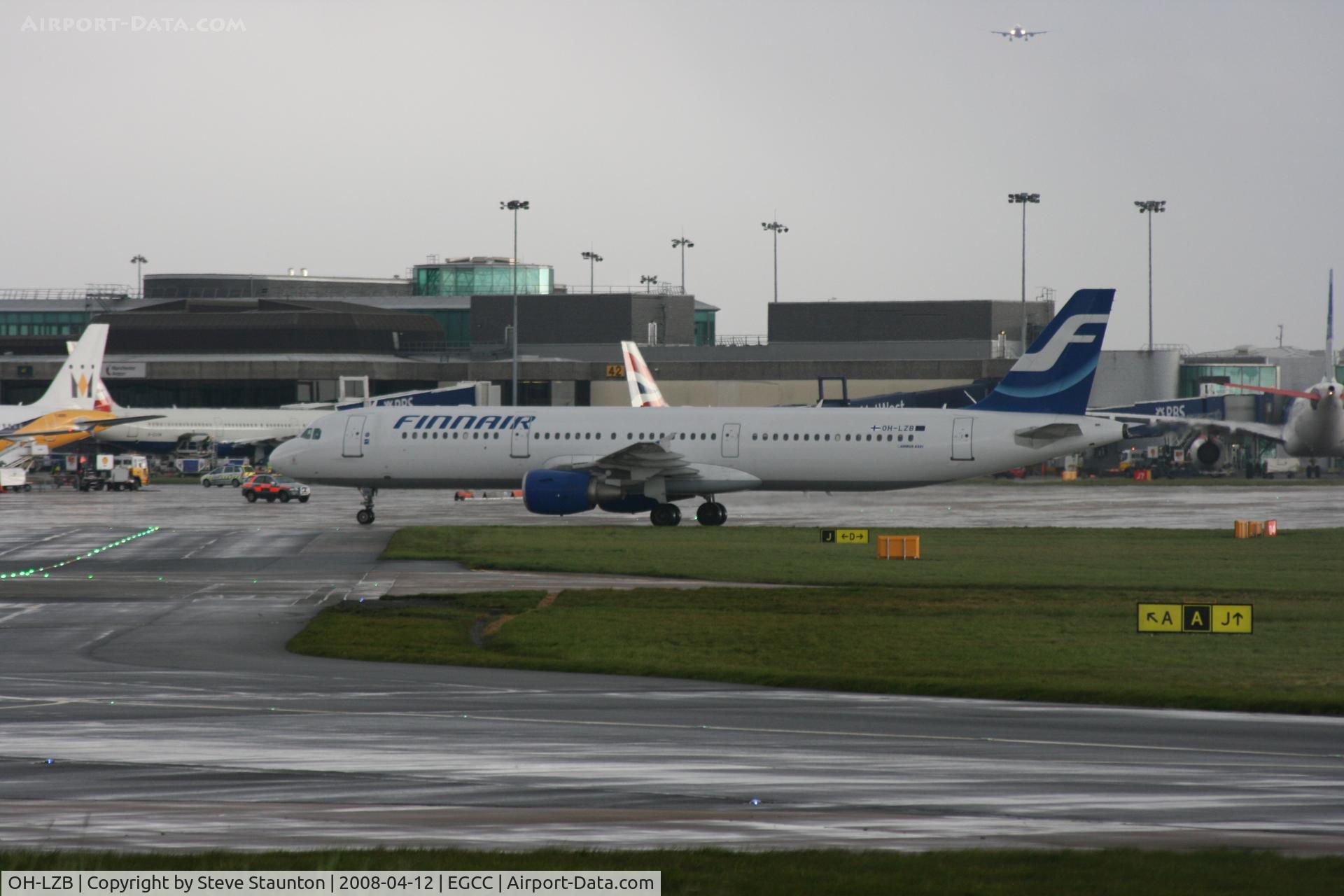 OH-LZB, 1999 Airbus A321-211 C/N 0961, Taken at Manchester Airport on a typical showery April day
