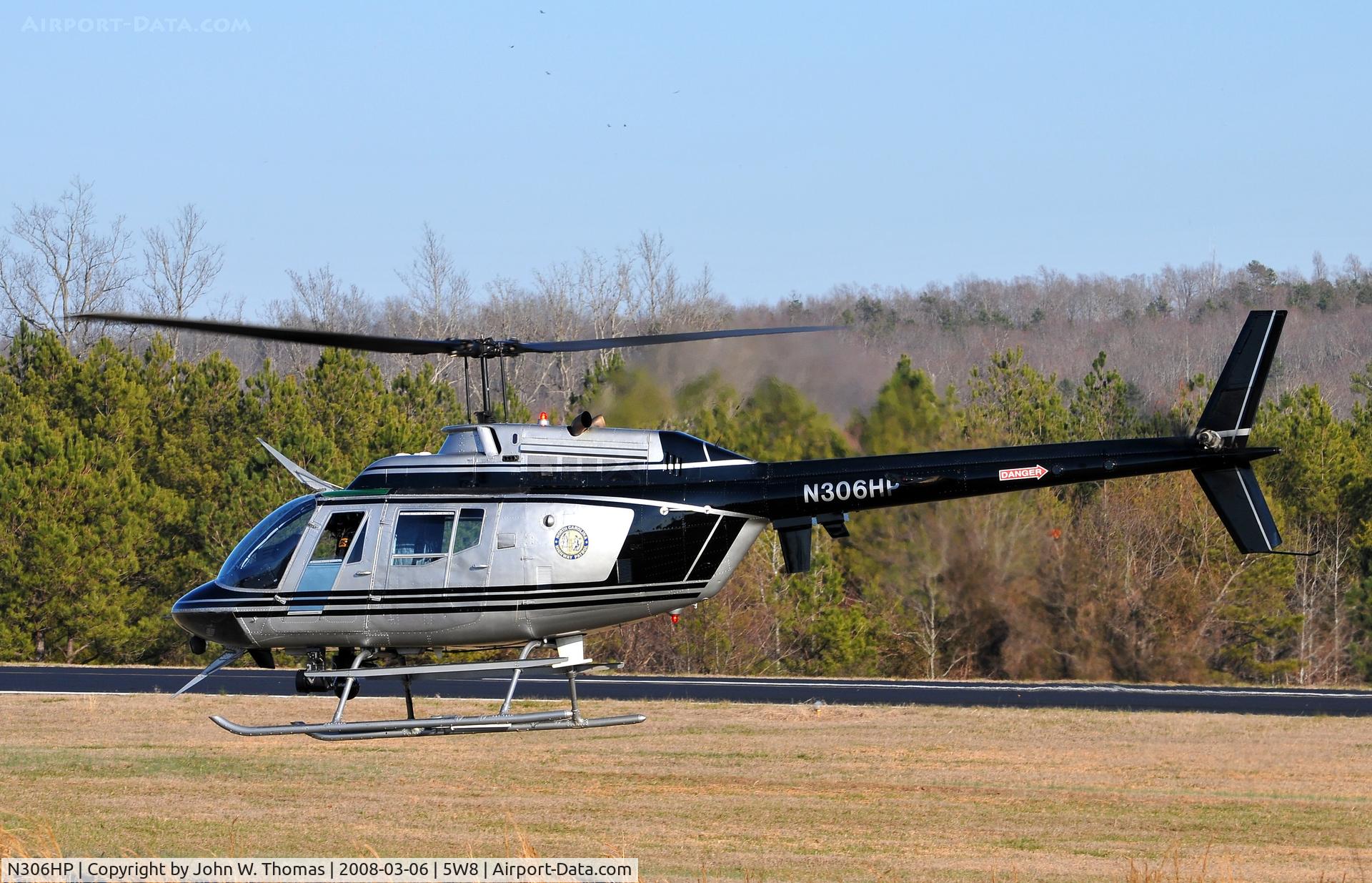 N306HP, Bell OH-58A C/N 71-20794, Lifting off