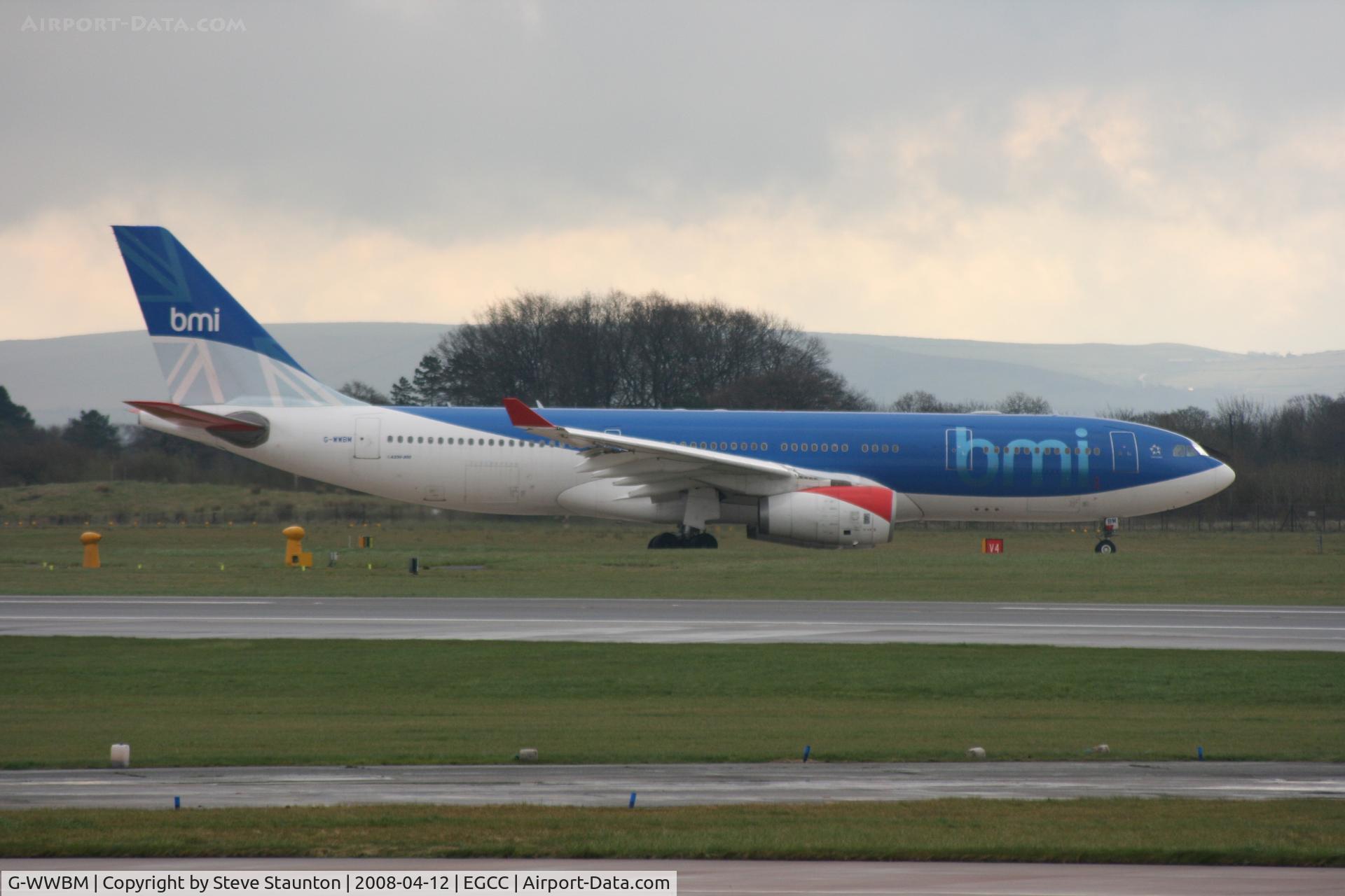 G-WWBM, 2001 Airbus A330-243 C/N 398, Taken at Manchester Airport on a typical showery April day