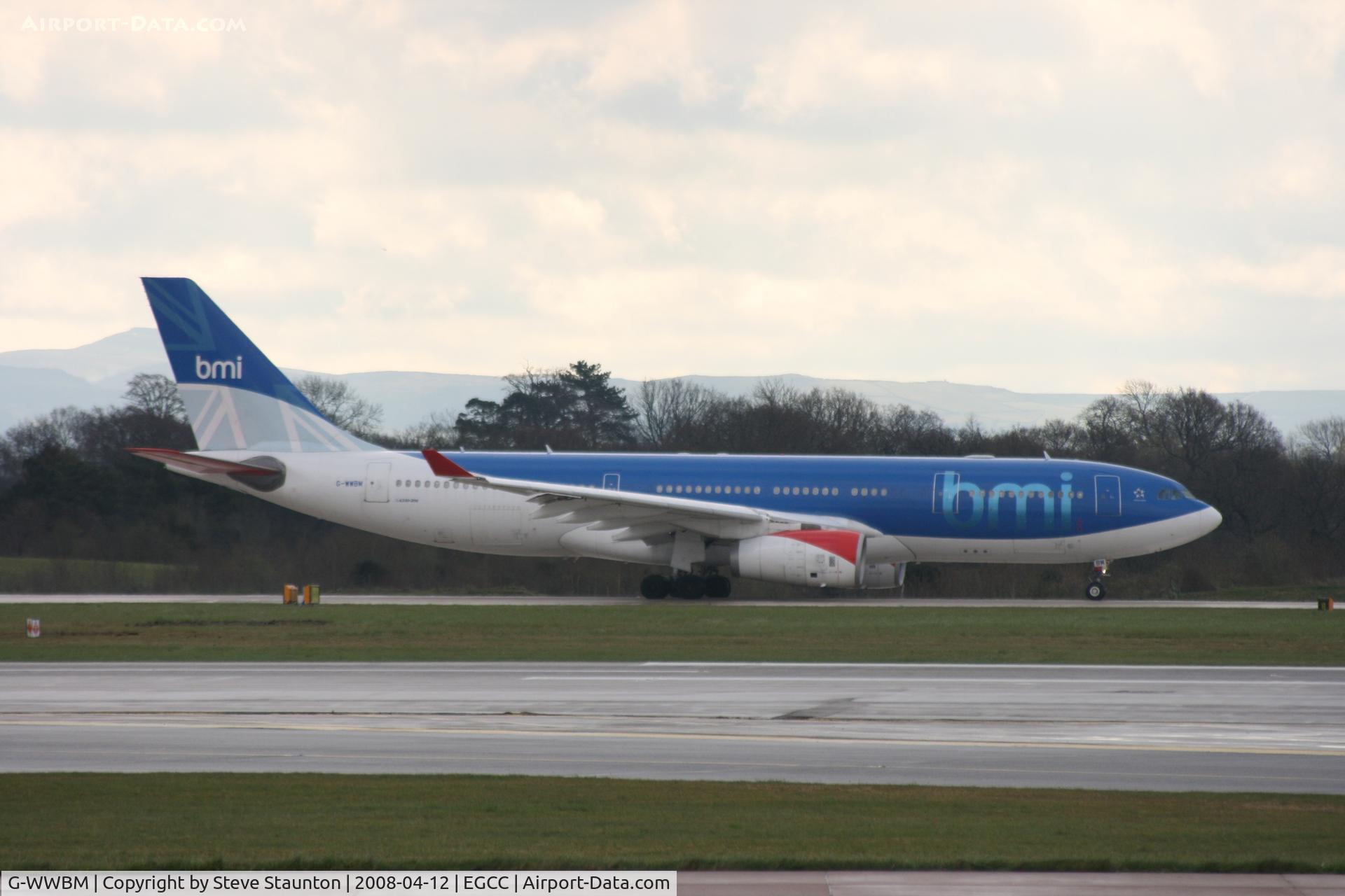 G-WWBM, 2001 Airbus A330-243 C/N 398, Taken at Manchester Airport on a typical showery April day