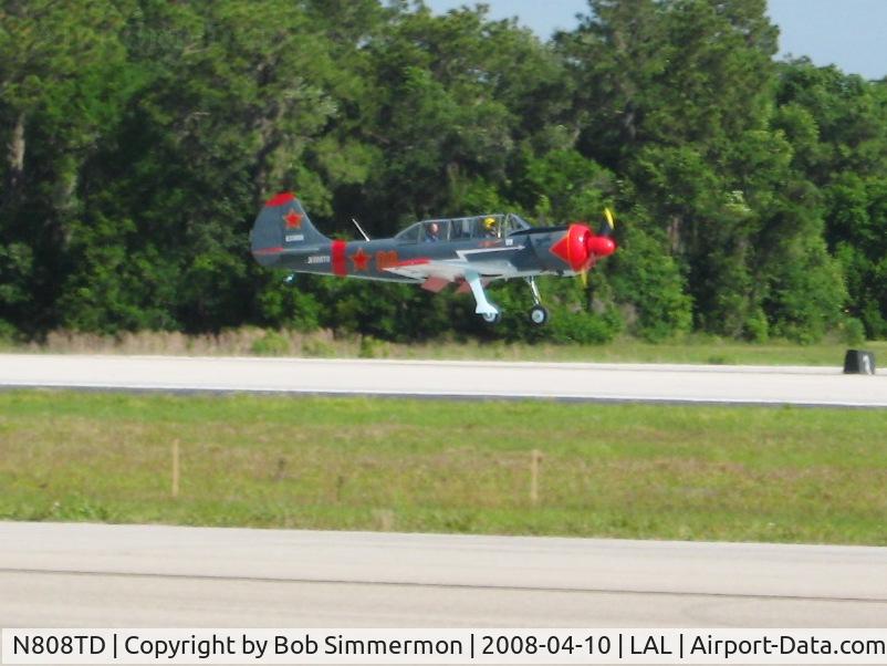 N808TD, Yakovlev (Aerostar) Yak-52 C/N 833808, Landing at Sun N Fun 2008