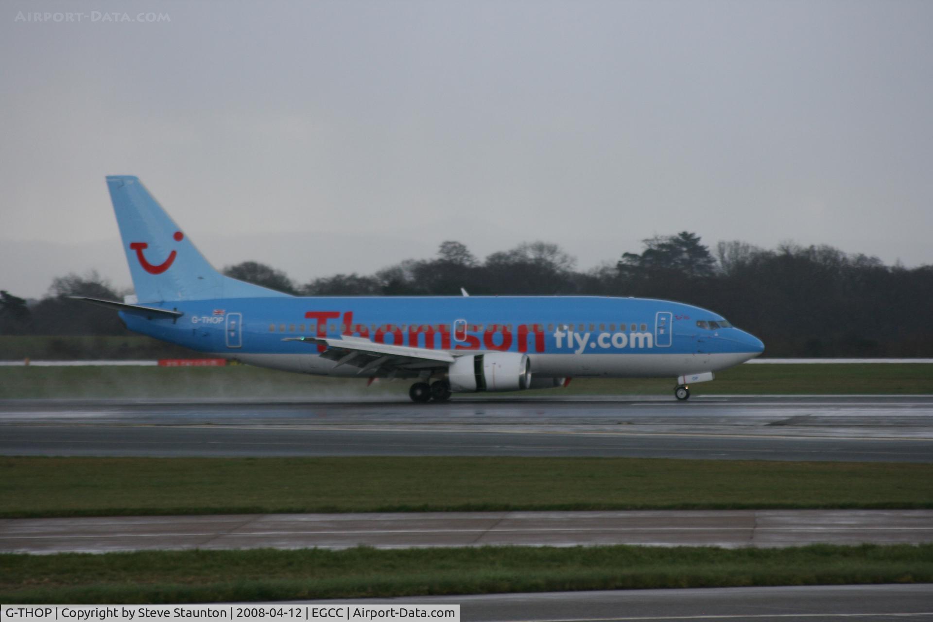G-THOP, 1998 Boeing 737-3U3 C/N 28740, Taken at Manchester Airport on a typical showery April day