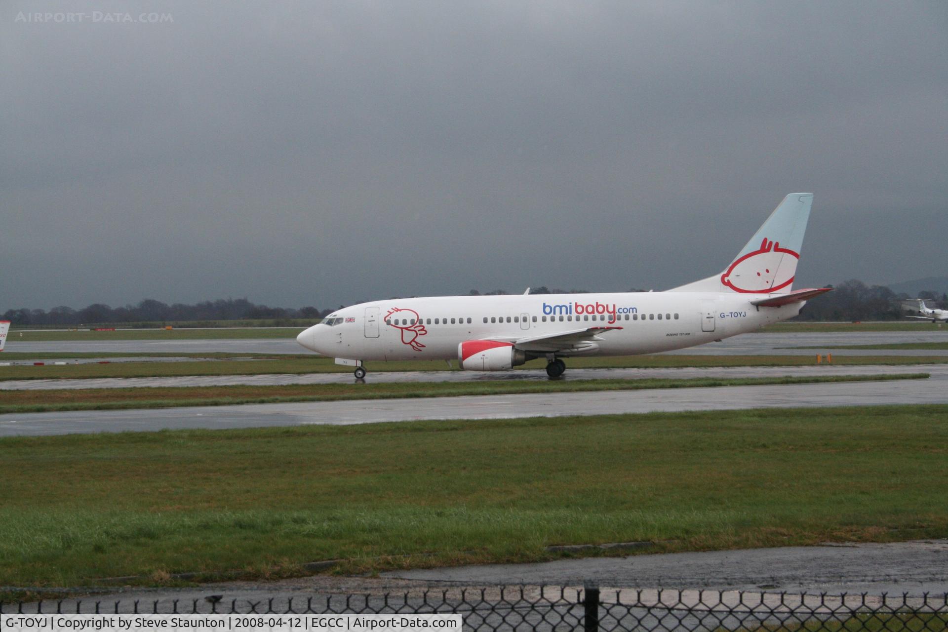 G-TOYJ, 1996 Boeing 737-36M C/N 28332, Taken at Manchester Airport on a typical showery April day