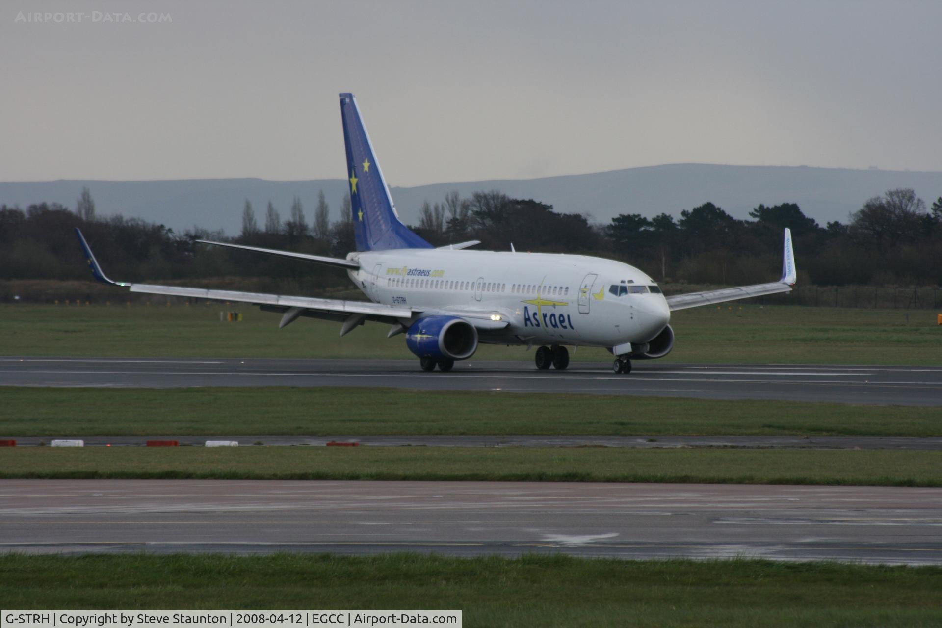G-STRH, 2002 Boeing 737-76N C/N 32737, Taken at Manchester Airport on a typical showery April day
