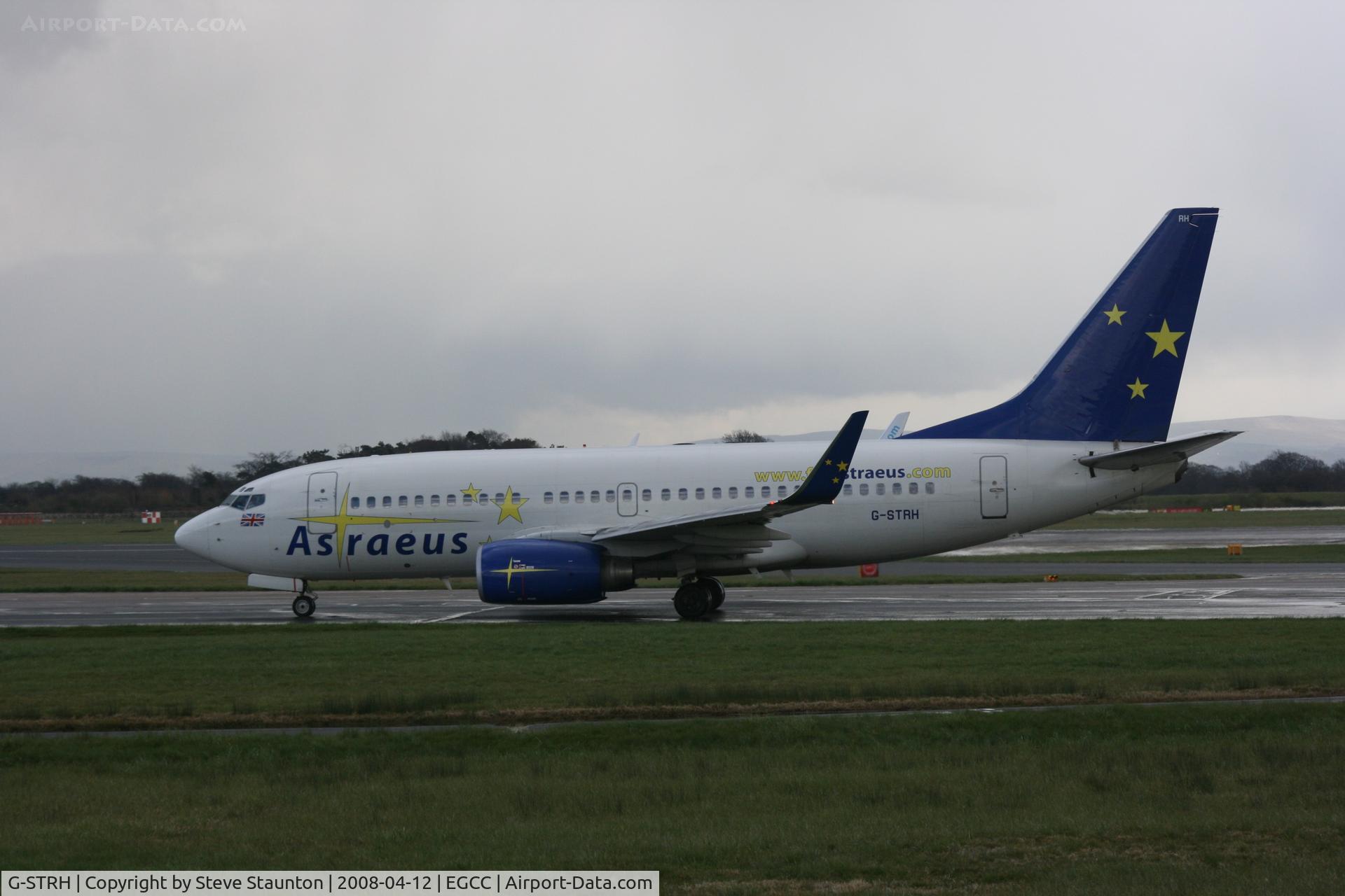 G-STRH, 2002 Boeing 737-76N C/N 32737, Taken at Manchester Airport on a typical showery April day