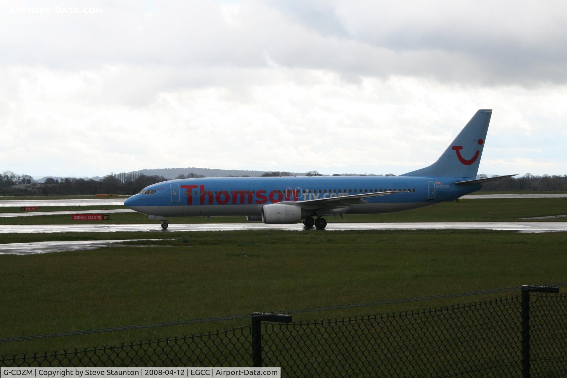 G-CDZM, 2000 Boeing 737-804 C/N 30466, Taken at Manchester Airport on a typical showery April day