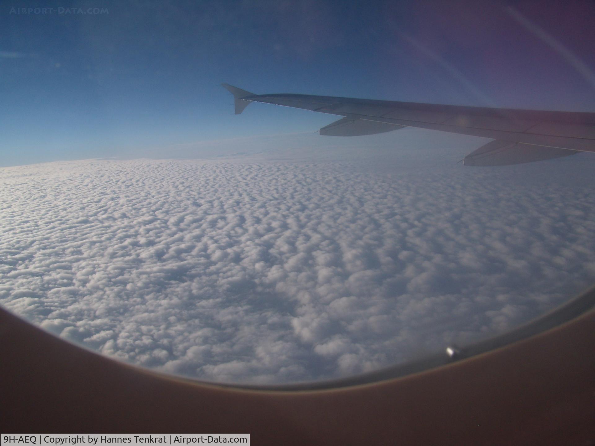 9H-AEQ, 2007 Airbus A320-214 C/N 3068, A320 in flight from seat 25A