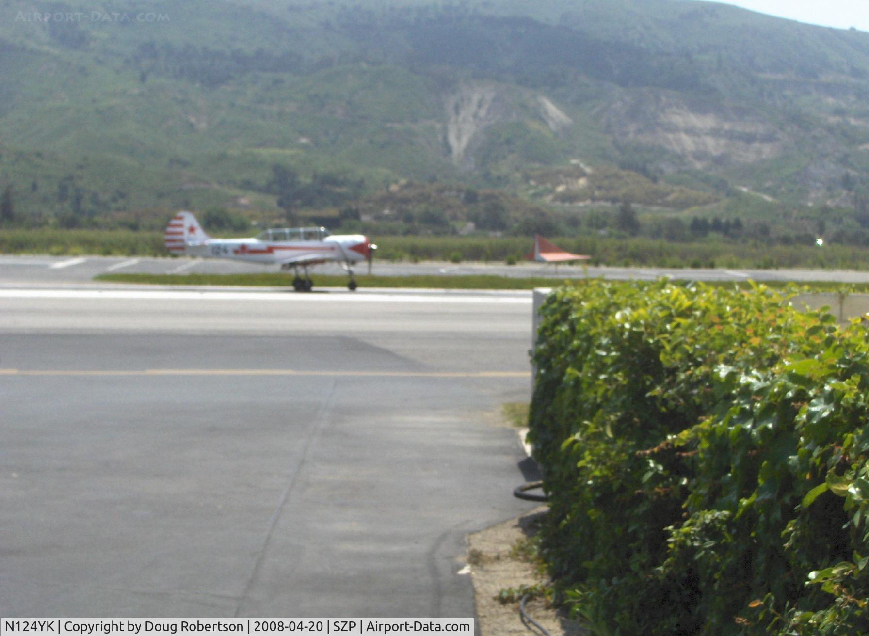 N124YK, 1984 Yakovlev Yak-52 C/N 844804, 1984 Intreprinderea de Avioane Bacau-Romania (Yakovlev) Yak 52 Vedeneev MP-14P 9 cylinder air-cooled radial 360 Hp, landing roll Rwy 22