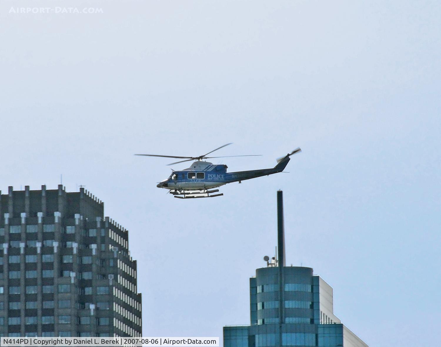 N414PD, 1999 Bell 412EP C/N 36233, New York's finest keep an eye on things near the waterfront.
