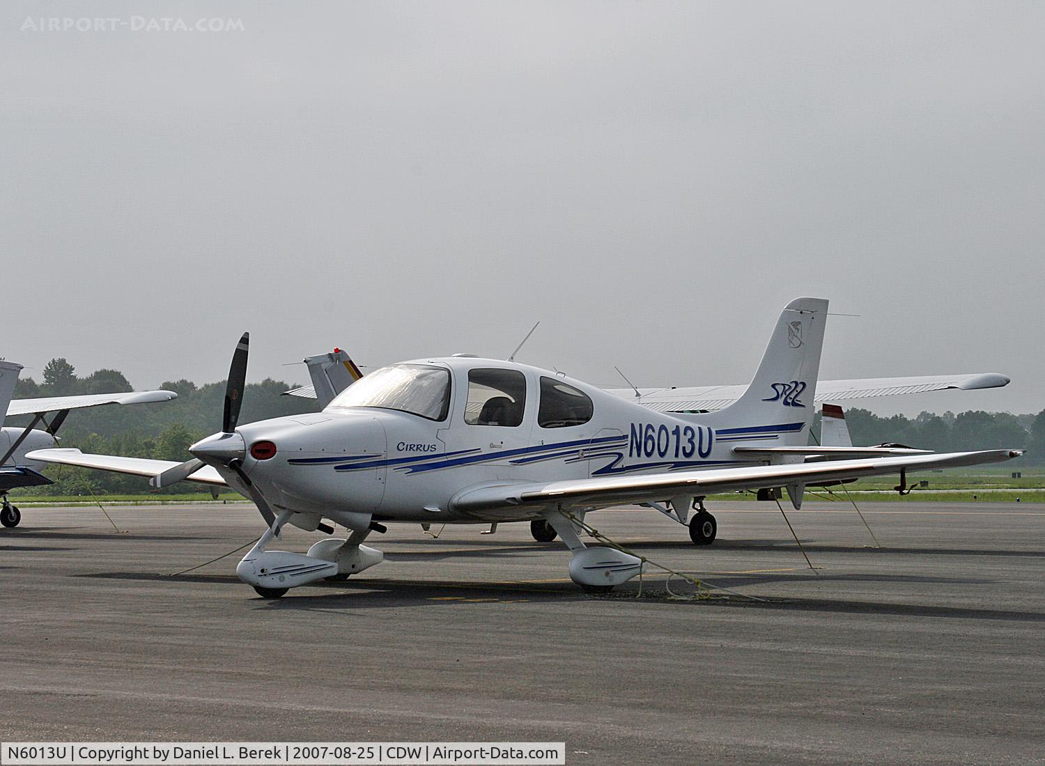 N6013U, 2003 Cirrus SR22 C/N 0603, Cool-looking plane on a hot August day.