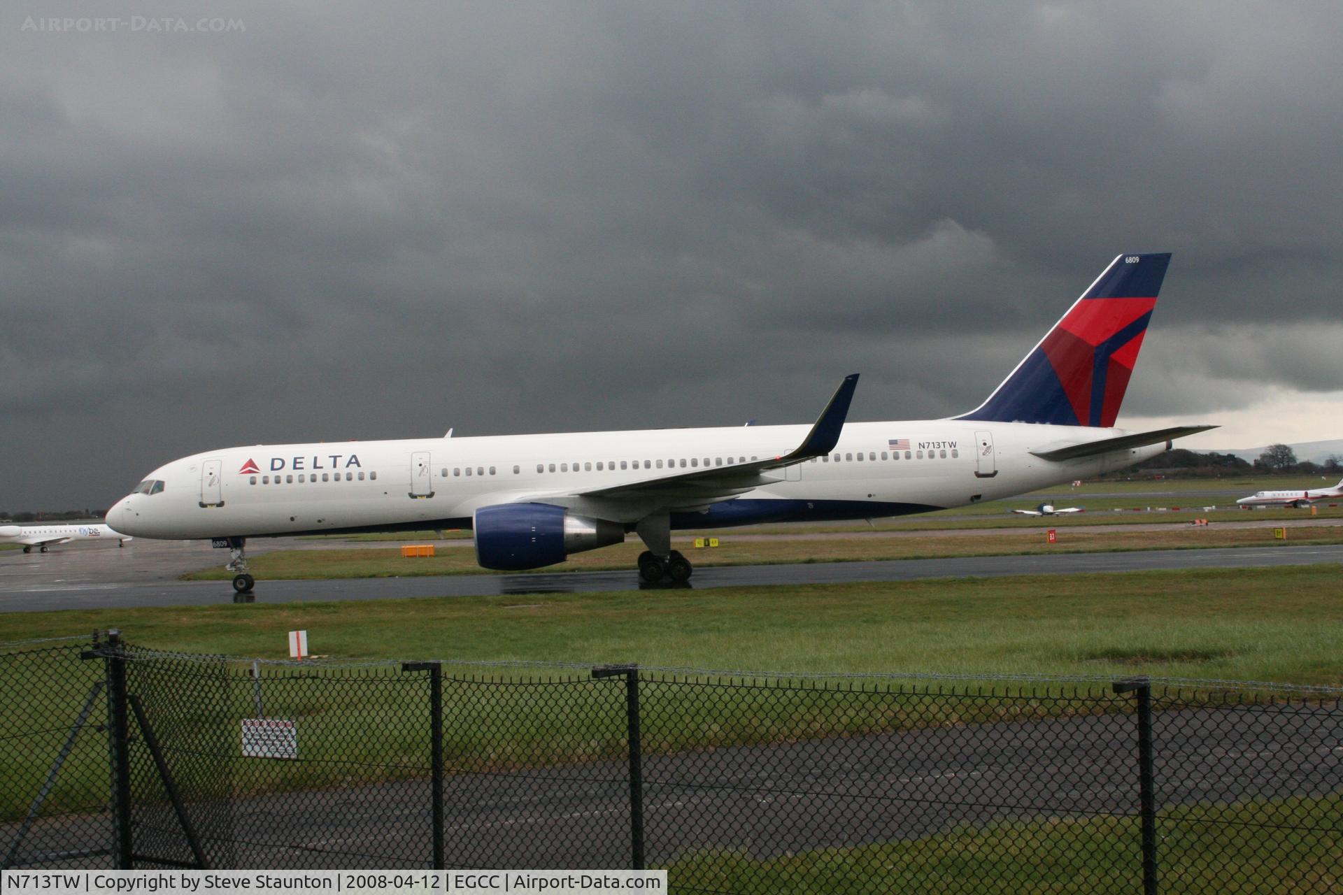 N713TW, 1997 Boeing 757-2Q8 C/N 28173, Taken at Manchester Airport on a typical showery April day