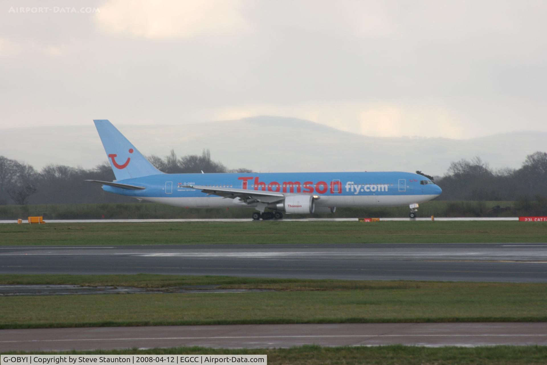 G-OBYI, 2000 Boeing 767-304/ER C/N 29138, Taken at Manchester Airport on a typical showery April day