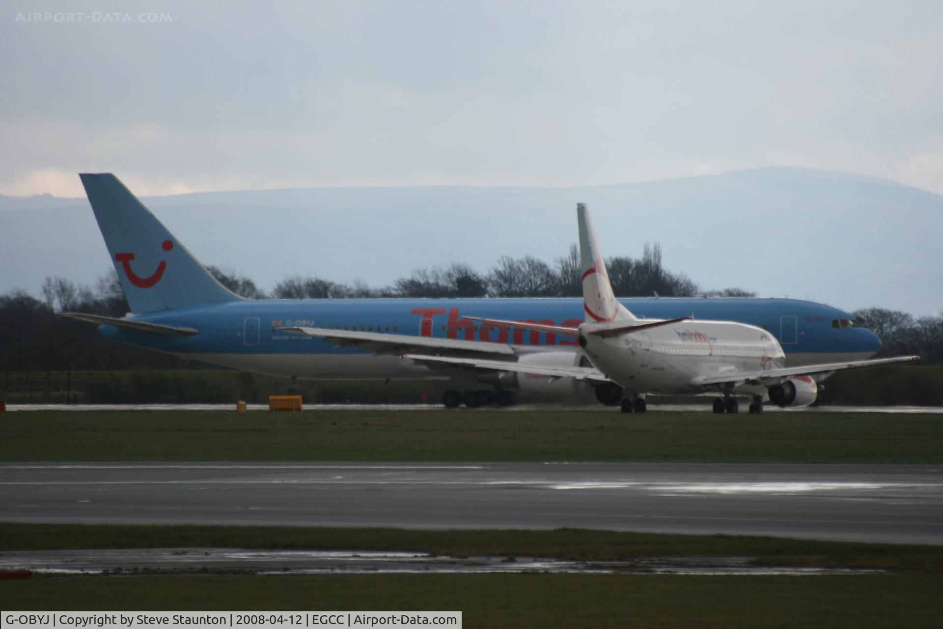 G-OBYJ, 2000 Boeing 767-304 C/N 29384, Taken at Manchester Airport on a typical showery April day