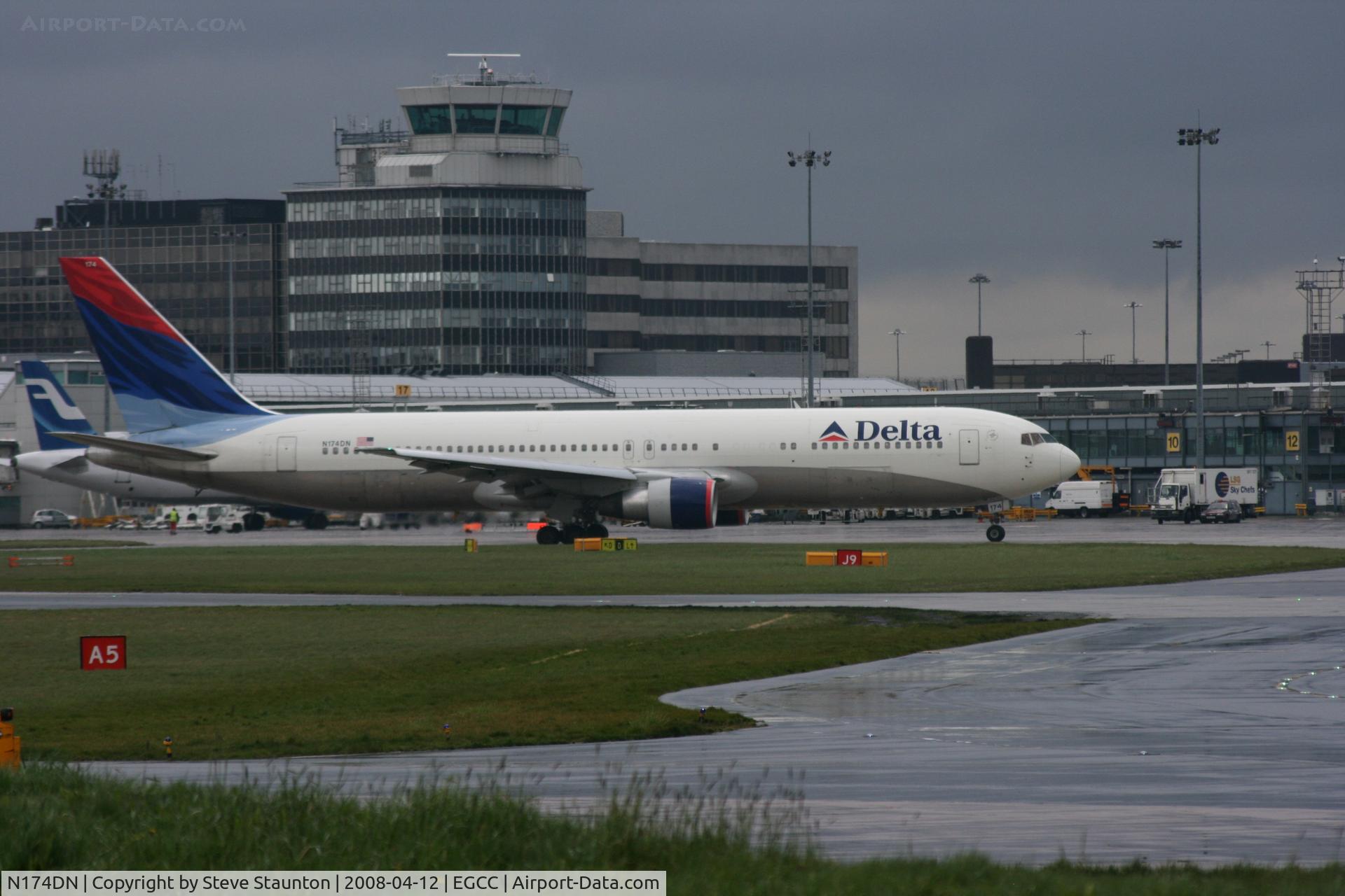 N174DN, 1990 Boeing 767-332 C/N 24802, Taken at Manchester Airport on a typical showery April day