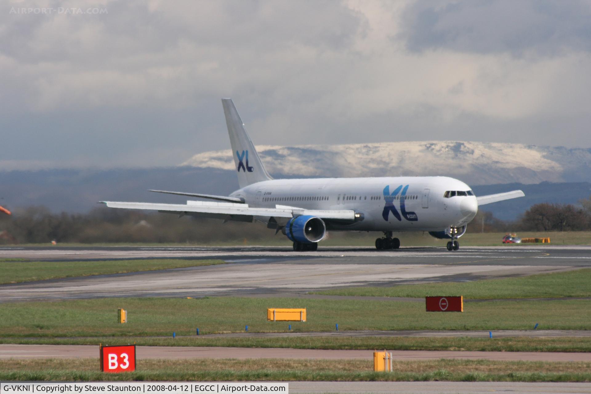 G-VKNI, 1989 Boeing 767-383/ER C/N 24358, Taken at Manchester Airport on a typical showery April day