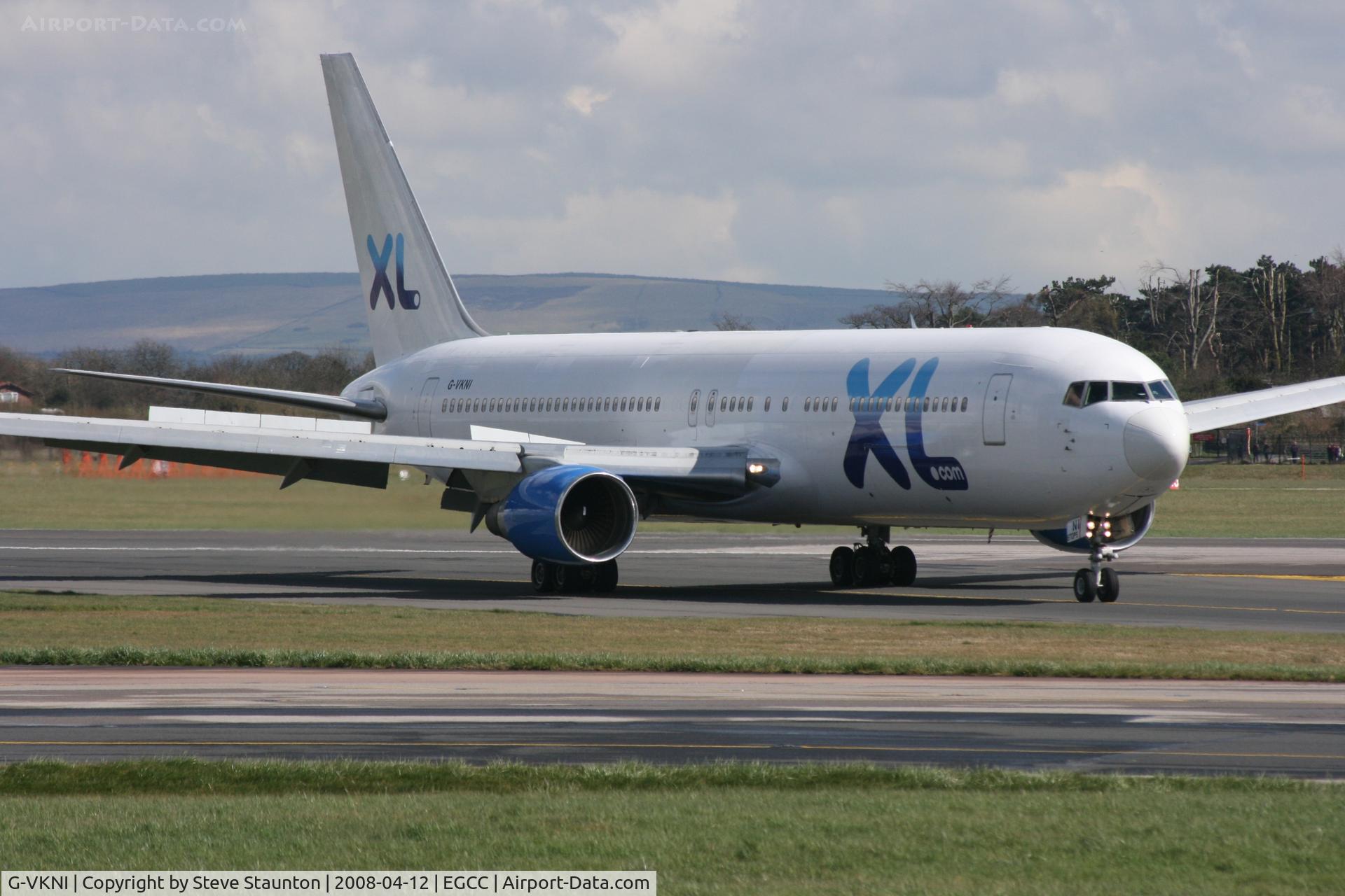 G-VKNI, 1989 Boeing 767-383/ER C/N 24358, Taken at Manchester Airport on a typical showery April day