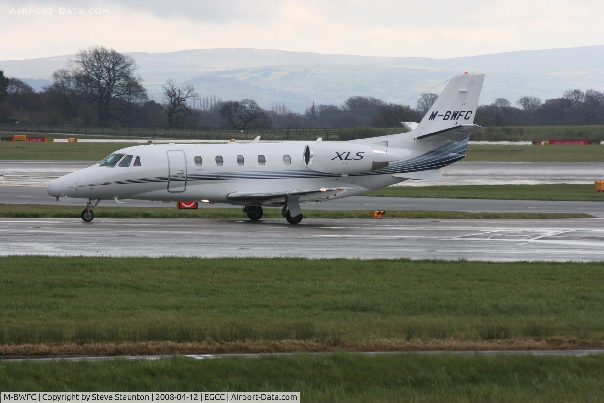 M-BWFC, Cessna 560XL Citation XLS C/N 560-5690, Taken at Manchester Airport on a typical showery April day