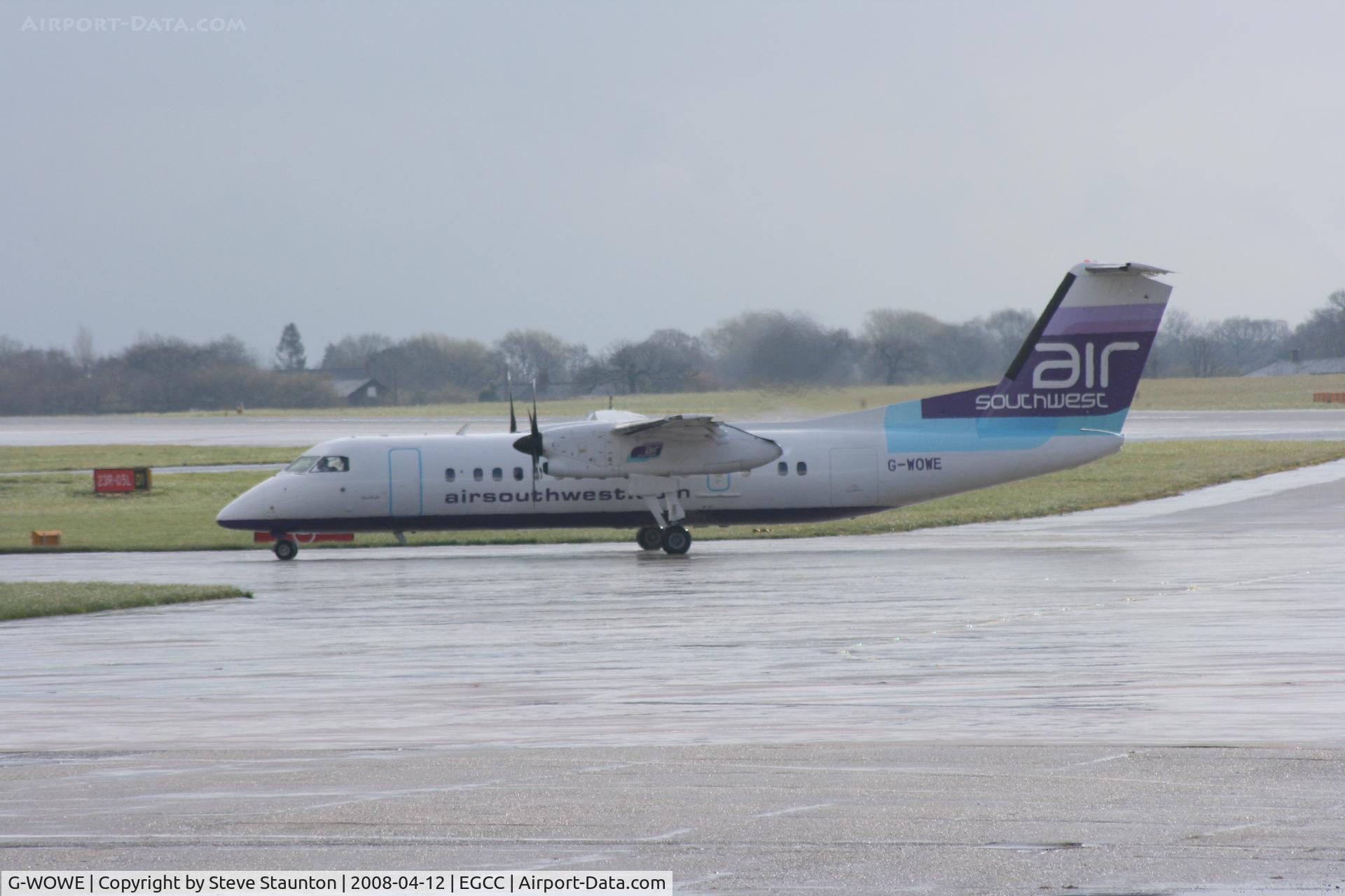 G-WOWE, 1991 De Havilland Canada DHC-8-311 Dash 8 C/N 256, Taken at Manchester Airport on a typical showery April day