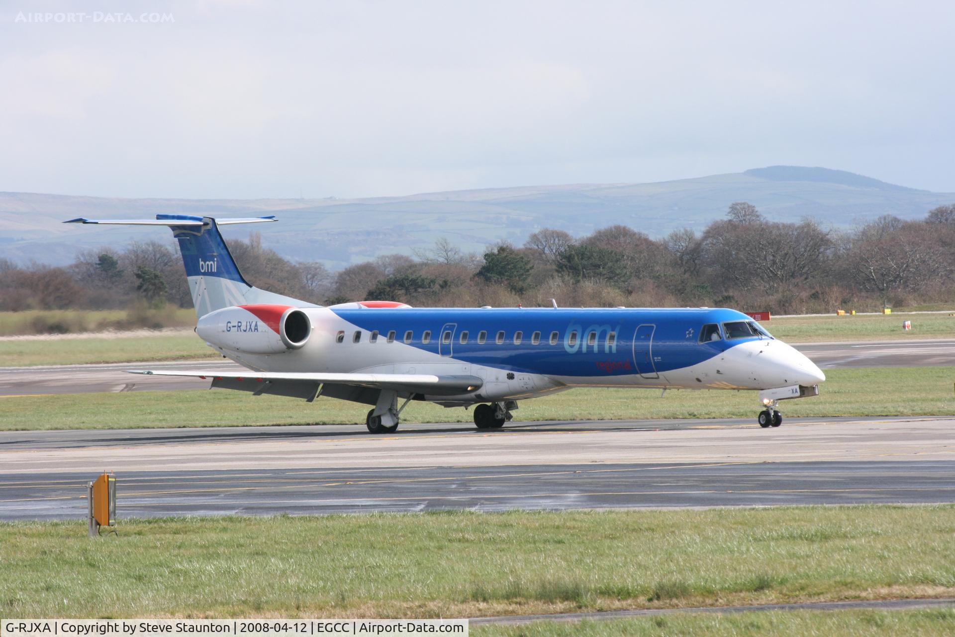 G-RJXA, 1999 Embraer EMB-145EP (ERJ-145EP) C/N 145136, Taken at Manchester Airport on a typical showery April day