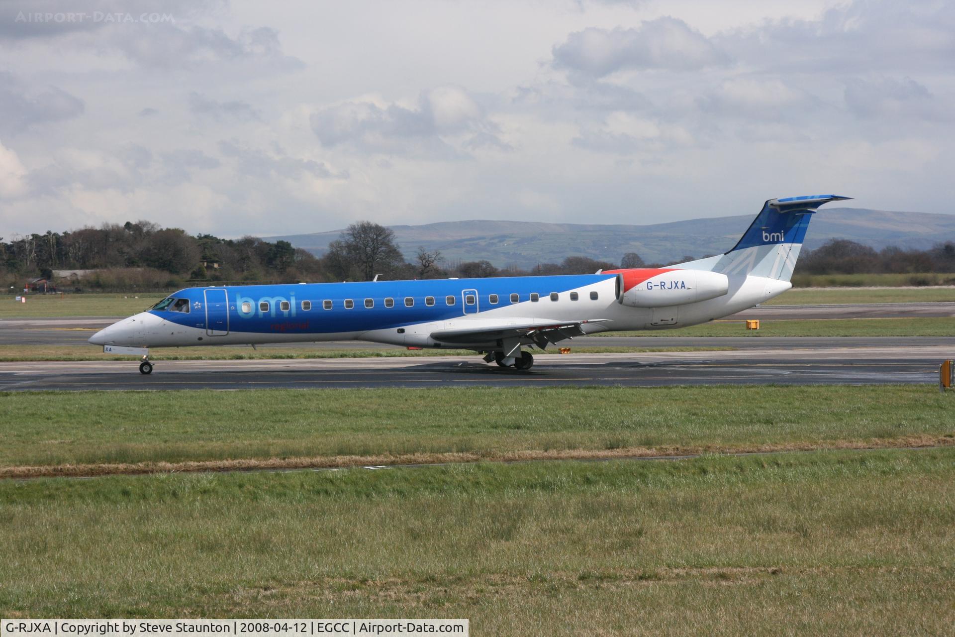G-RJXA, 1999 Embraer EMB-145EP (ERJ-145EP) C/N 145136, Taken at Manchester Airport on a typical showery April day