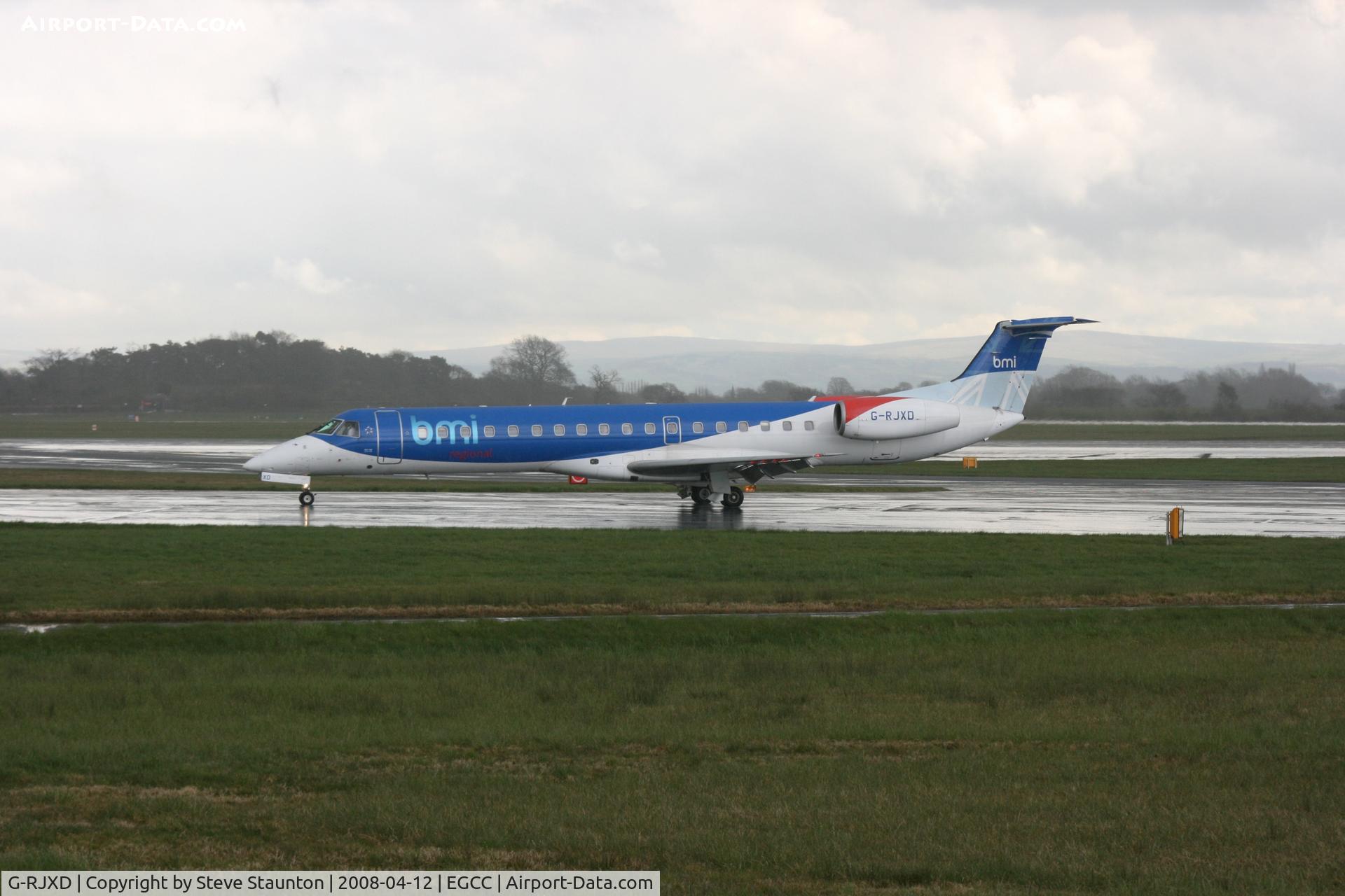G-RJXD, 2000 Embraer EMB-145EP (ERJ-145EP) C/N 145207, Taken at Manchester Airport on a typical showery April day